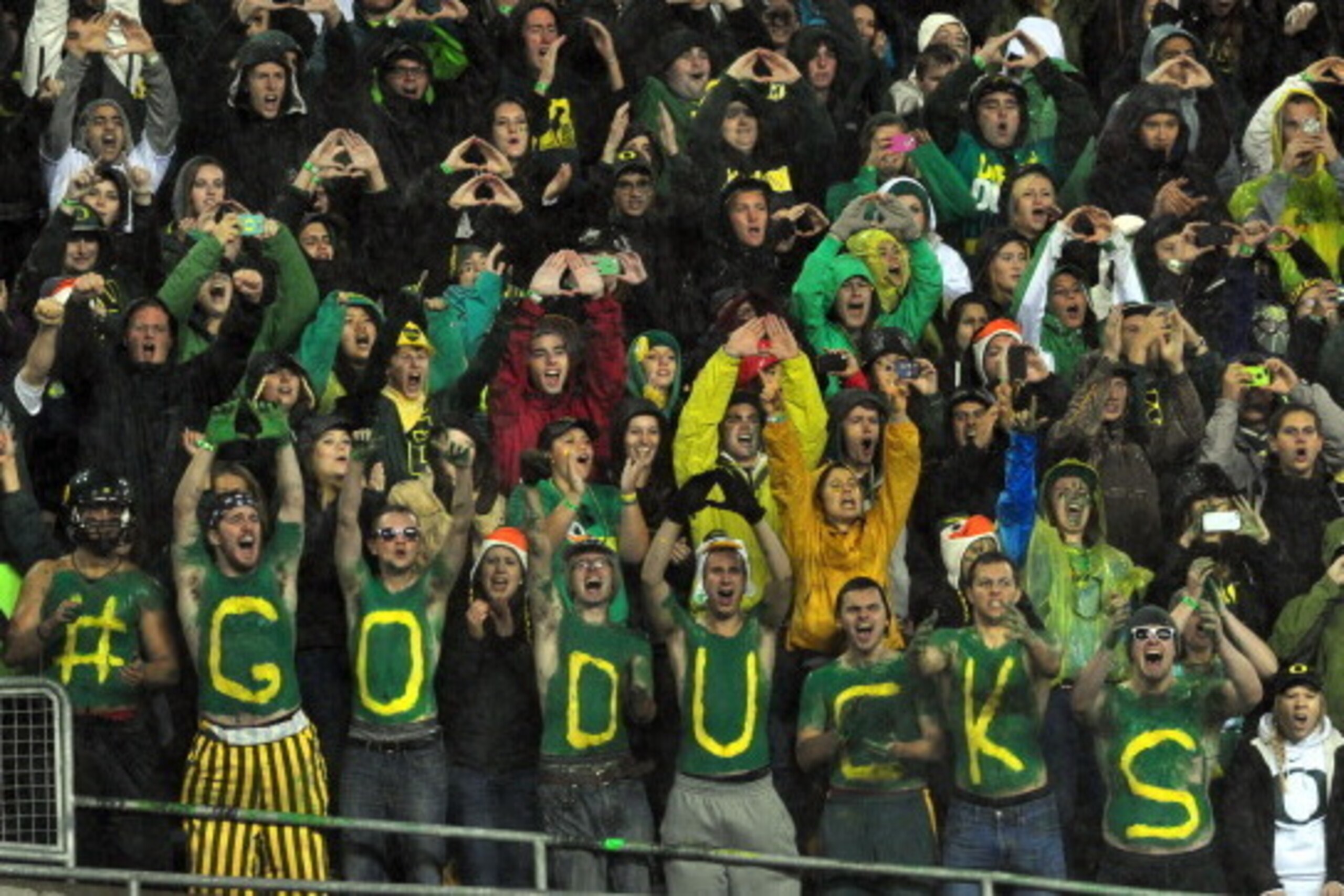 EUGENE, OR - SEPTEMBER 28: Oregon Ducks fans cheer during the first quarter of the game between the Oregon Ducks and the California Golden Bears at Autzen Stadium on September 28, 2013 in Eugene, Oregon. (Photo by Steve Dykes/Getty Images) EUGENE, OR - SEPTEMBER 28: Oregon Ducks fans cheer during the first quarter of the game between the Oregon Ducks and the California Golden Bears at Autzen Stadium on September 28, 2013 in Eugene, Oregon. (Photo by Steve Dykes/Getty Images)