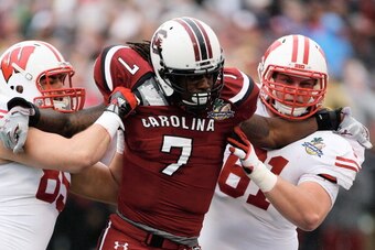 ORLANDO, FL - JANUARY 01:  Jadeveon Clowney #7 of the South Carolina Gamecocks in action during their game against the Wisconsin Badgers at the Capital One Bowl on January 1, 2014 in Orlando, Florida.  (Photo by Scott Halleran/Getty Images)