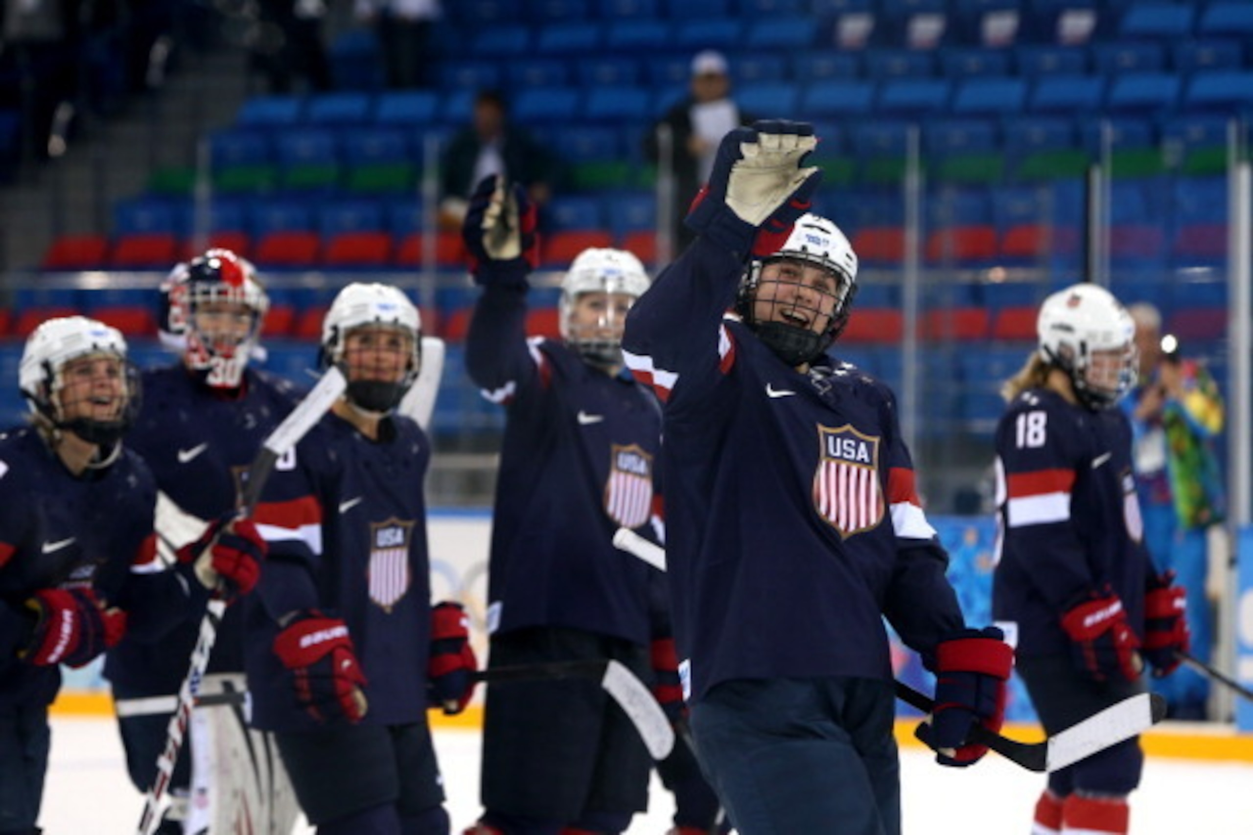 SOCHI, RUSSIA - FEBRUARY 17: Megan Bozek #9 of the United States waves to the crowd with teammates after defeating Sweden 6-1 during the Women's Ice Hockey Playoffs Semifinal game on day ten of the Sochi 2014 Winter Olympics at Shayba Arena on February 17 SOCHI, RUSSIA - FEBRUARY 17: Megan Bozek #9 of the United States waves to the crowd with teammates after defeating Sweden 6-1 during the Women's Ice Hockey Playoffs Semifinal game on day ten of the Sochi 2014 Winter Olympics at Shayba Arena on February 17