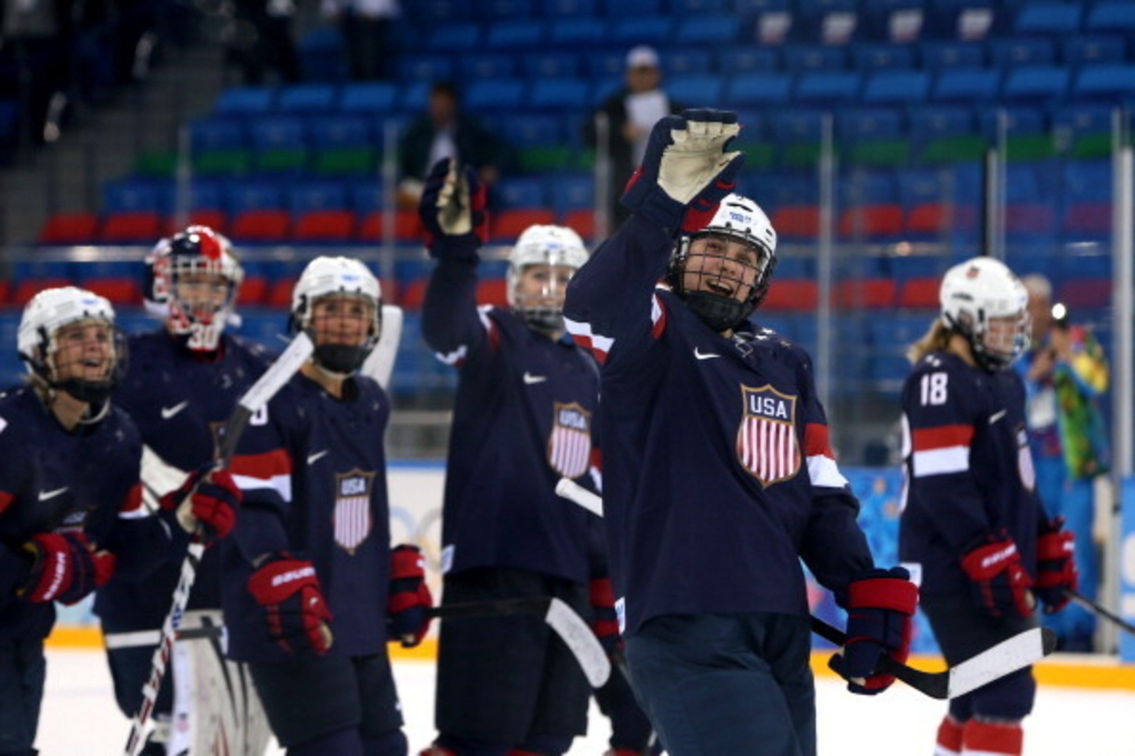 SOCHI, RUSSIA - FEBRUARY 17: Megan Bozek #9 of the United States waves to the crowd with teammates after defeating Sweden 6-1 during the Women's Ice Hockey Playoffs Semifinal game on day ten of the Sochi 2014 Winter Olympics at Shayba Arena on February 17 SOCHI, RUSSIA - FEBRUARY 17: Megan Bozek #9 of the United States waves to the crowd with teammates after defeating Sweden 6-1 during the Women's Ice Hockey Playoffs Semifinal game on day ten of the Sochi 2014 Winter Olympics at Shayba Arena on February 17