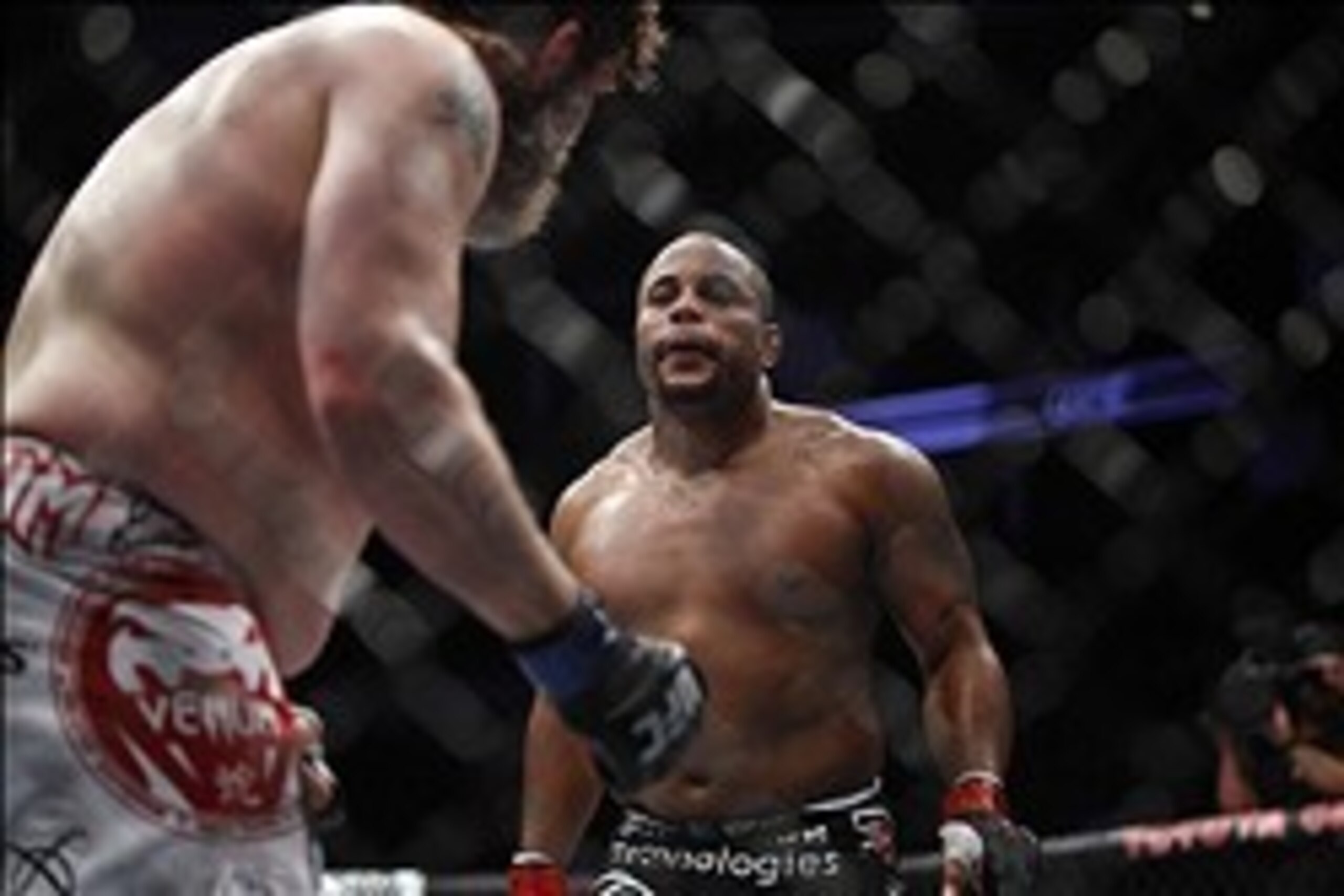 Oct 19, 2013; Houston, TX, USA; Daniel Cormier (red gloves) fights against Roy Nelson (blue gloves) in their heavyweight bout during UFC 166 at Toyota Center. Mandatory Credit: Andrew Richardson-USA TODAY Sports