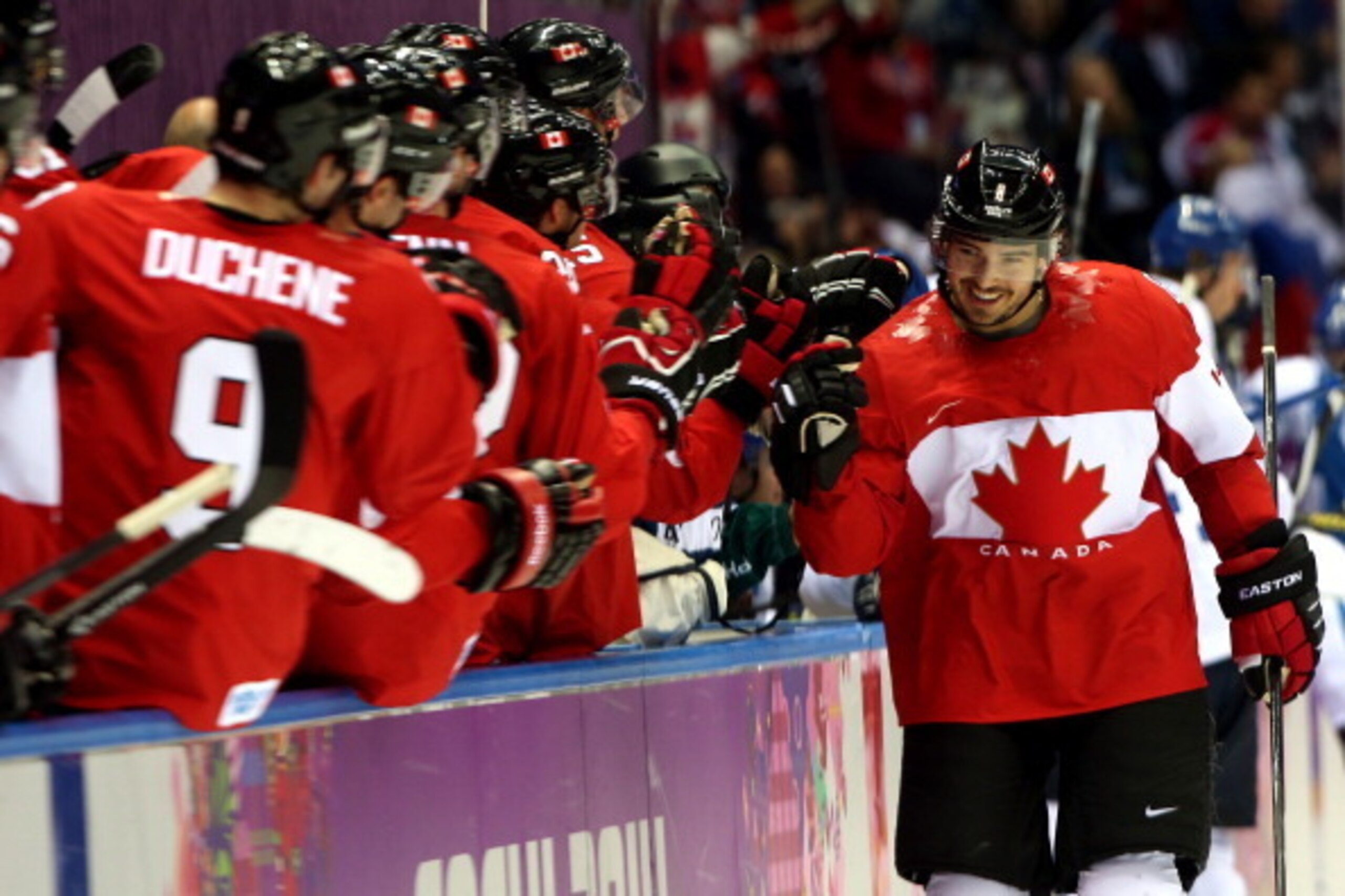 SOCHI, RUSSIA - FEBRUARY 16:  Drew Doughty #8 of Canada celebrates with his teammates after scoring a goal in the first period against Tuukka Rask #40 of Finland during the Men's Ice Hockey Preliminary Round Group B game on day nine of the Sochi 2014 Wint