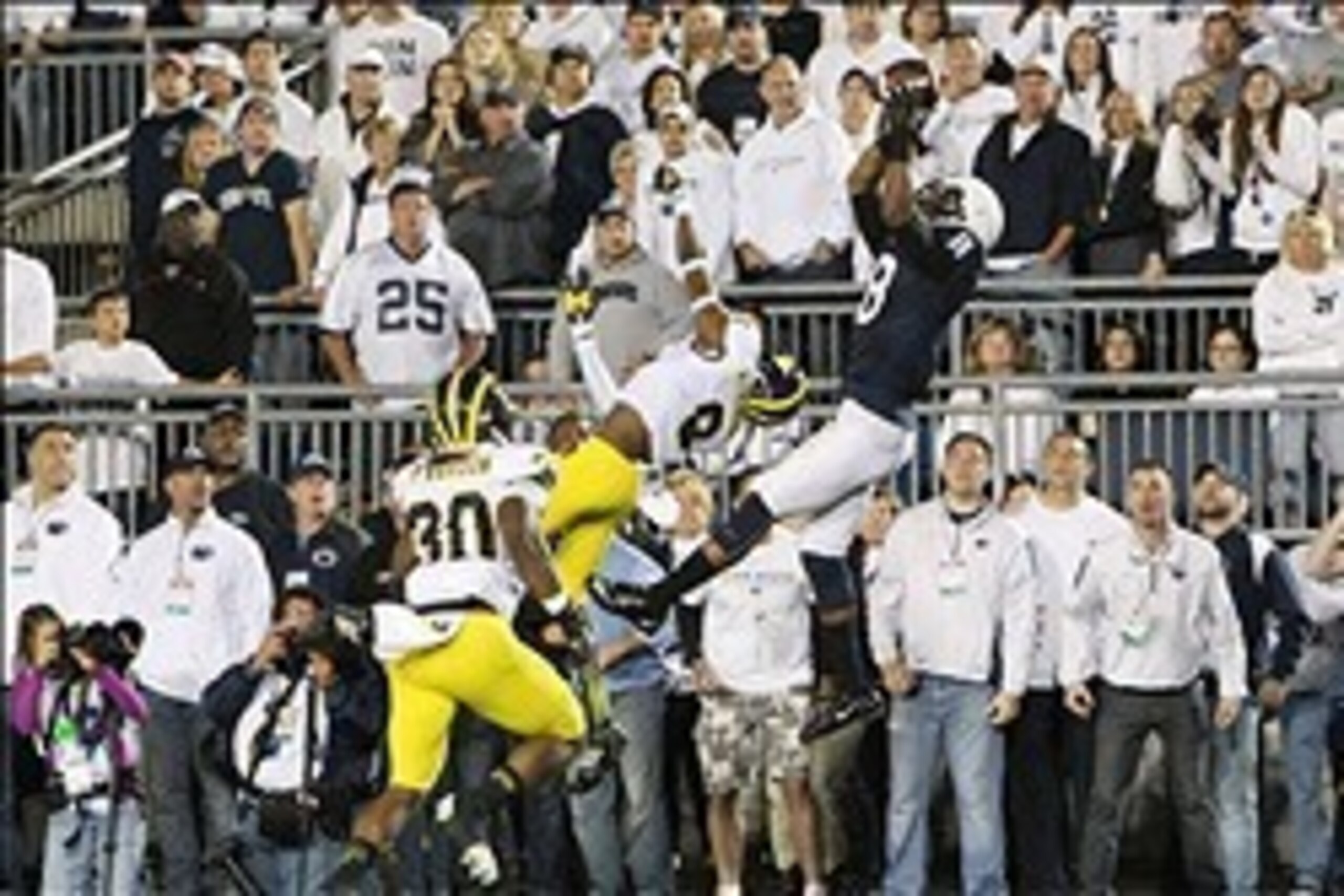 Oct 12, 2013; University Park, PA, USA; Penn State Nittany Lions wide receiver Allen Robinson (8) makes a catch during the fourth quarter against the Michigan Wolverines at Beaver Stadium. Penn State defeated Michigan 43-40 in overtime. Mandatory Credit: 