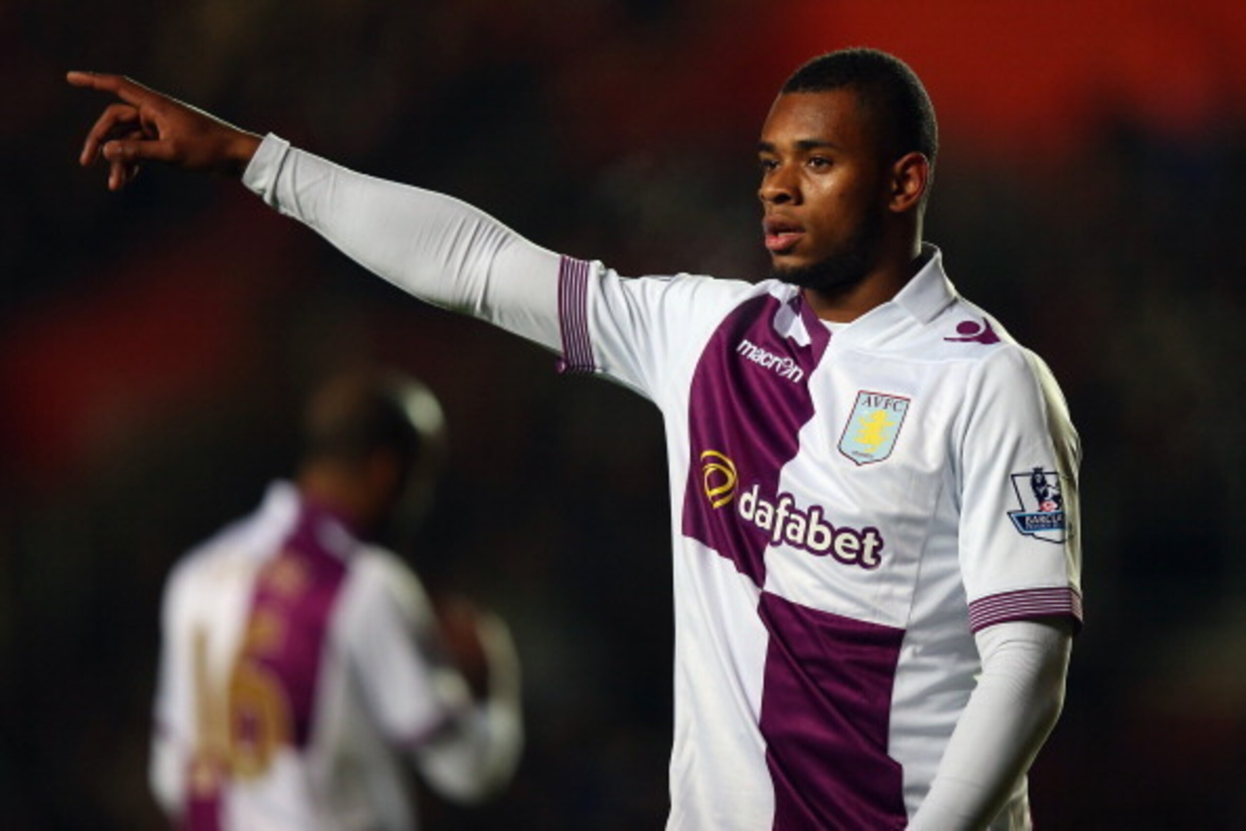 SOUTHAMPTON, ENGLAND - DECEMBER 04:  Leandro Bacuna of Aston Villa instructs his team during the Barclays Premier League match between Southampton and Aston Villa at St Mary's Stadium on December 4, 2013 in Southampton, England.  (Photo by Bryn Lennon/Get