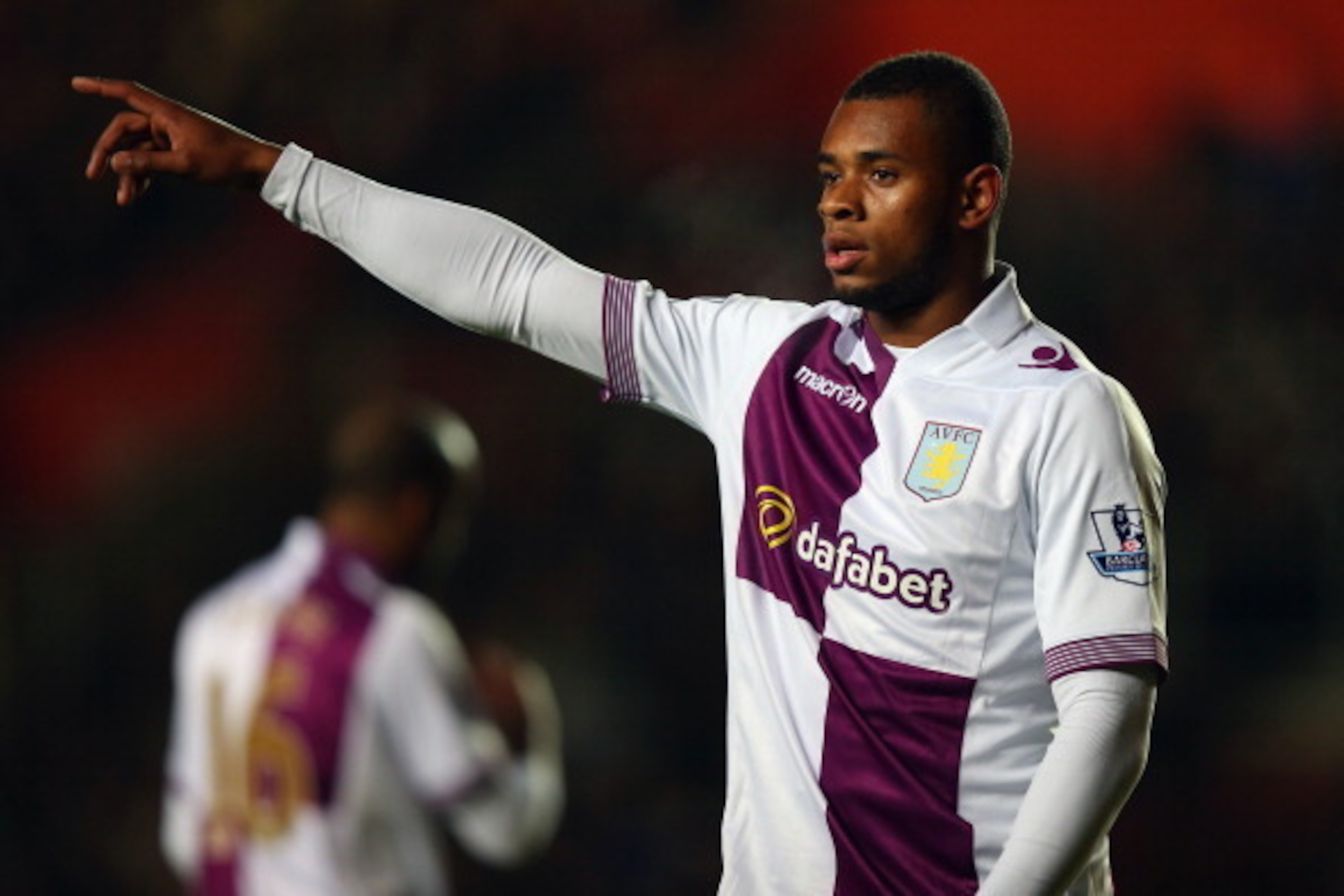 SOUTHAMPTON, ENGLAND - DECEMBER 04:  Leandro Bacuna of Aston Villa instructs his team during the Barclays Premier League match between Southampton and Aston Villa at St Mary's Stadium on December 4, 2013 in Southampton, England.  (Photo by Bryn Lennon/Get