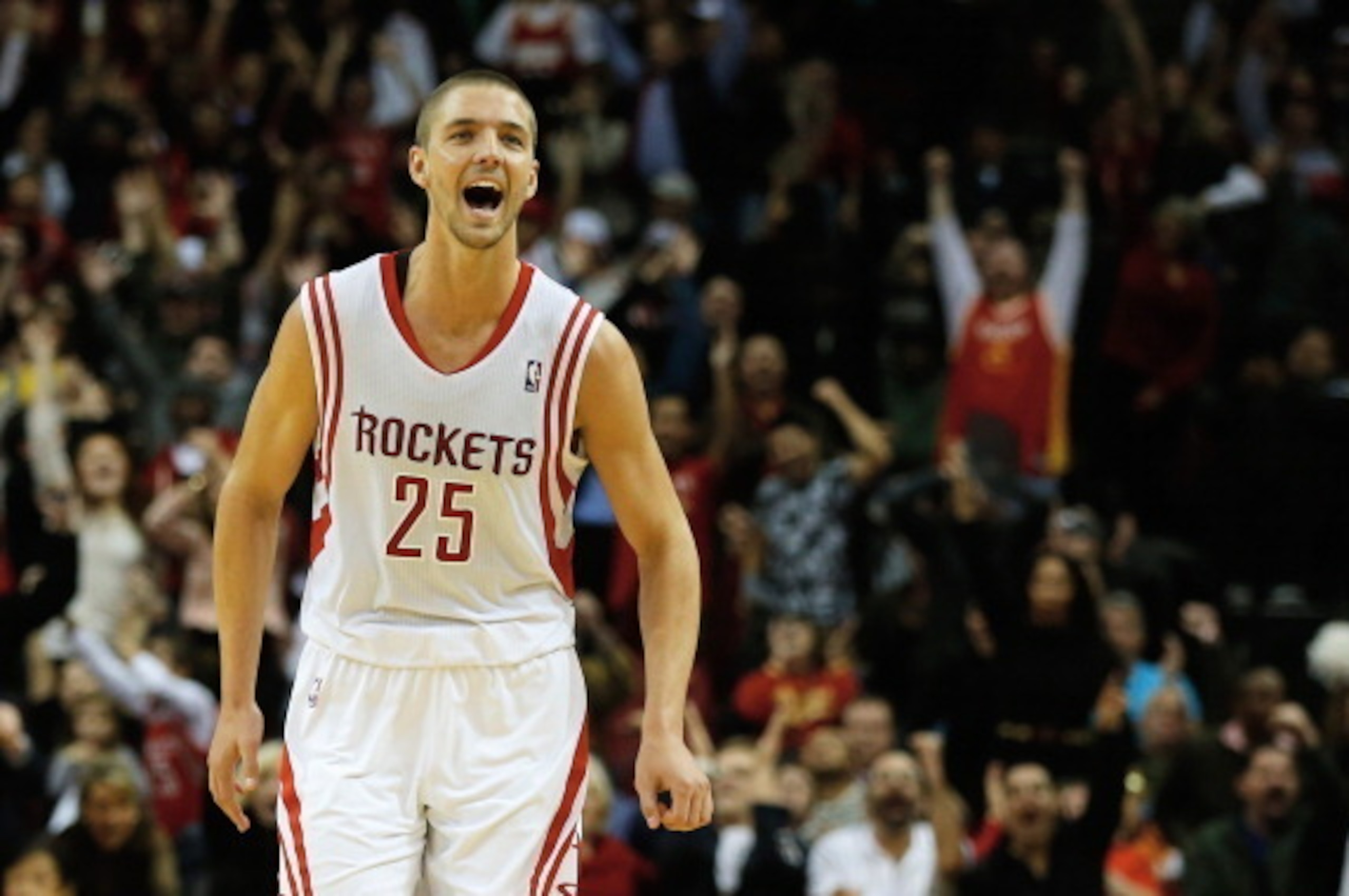 HOUSTON, TX - JANUARY 24:  Chandler Parsons #25 of the Houston Rockets celebrates a three-pointer against the Memphis Grizzlies during the game at the Toyota Center on January 24, 2014 in Houston, Texas. NOTE TO USER: User expressly acknowledges and agree