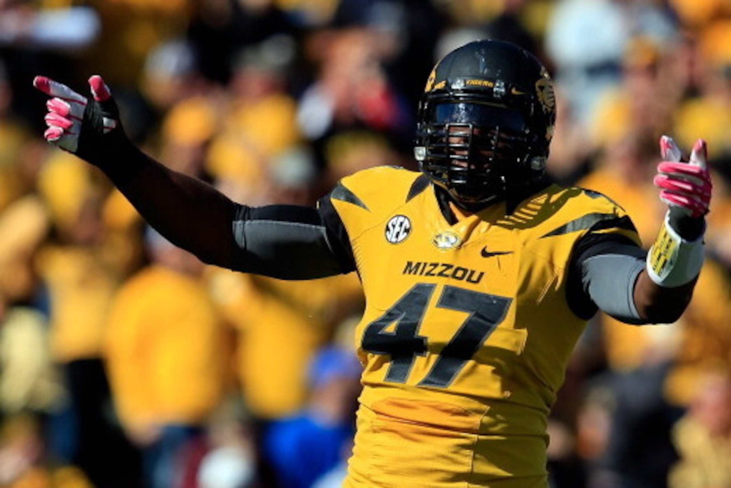 COLUMBIA, MO - OCTOBER 19: Defensive lineman Kony Ealy #47 of the Missouri Tigers reacts after a sack of quarterback Tyler Murphy #3 of the Florida Gator sduring the game at Faurot Field/Memorial Stadium on October 19, 2013 in Columbia, Missouri. (Photo COLUMBIA, MO - OCTOBER 19: Defensive lineman Kony Ealy #47 of the Missouri Tigers reacts after a sack of quarterback Tyler Murphy #3 of the Florida Gator sduring the game at Faurot Field/Memorial Stadium on October 19, 2013 in Columbia, Missouri. (Photo
