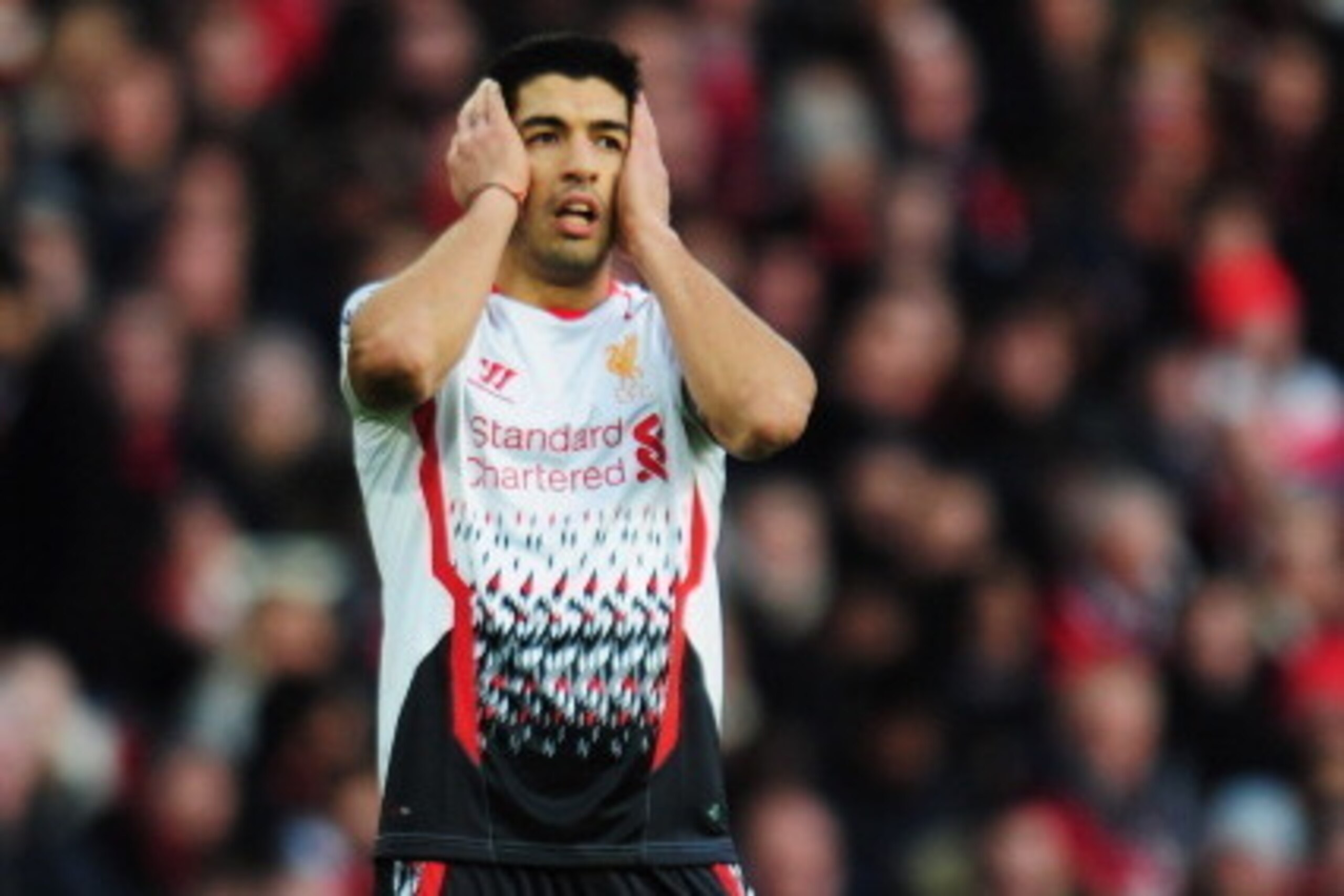 LONDON, ENGLAND - FEBRUARY 16: Luis Suarez of Liverpool reacts during the FA Cup Fifth Round match between Arsenal and Liverpool at the Emirates Stadium on February 16, 2014 in London, England. (Photo by Shaun Botterill/Getty Images) LONDON, ENGLAND - FEBRUARY 16: Luis Suarez of Liverpool reacts during the FA Cup Fifth Round match between Arsenal and Liverpool at the Emirates Stadium on February 16, 2014 in London, England. (Photo by Shaun Botterill/Getty Images)