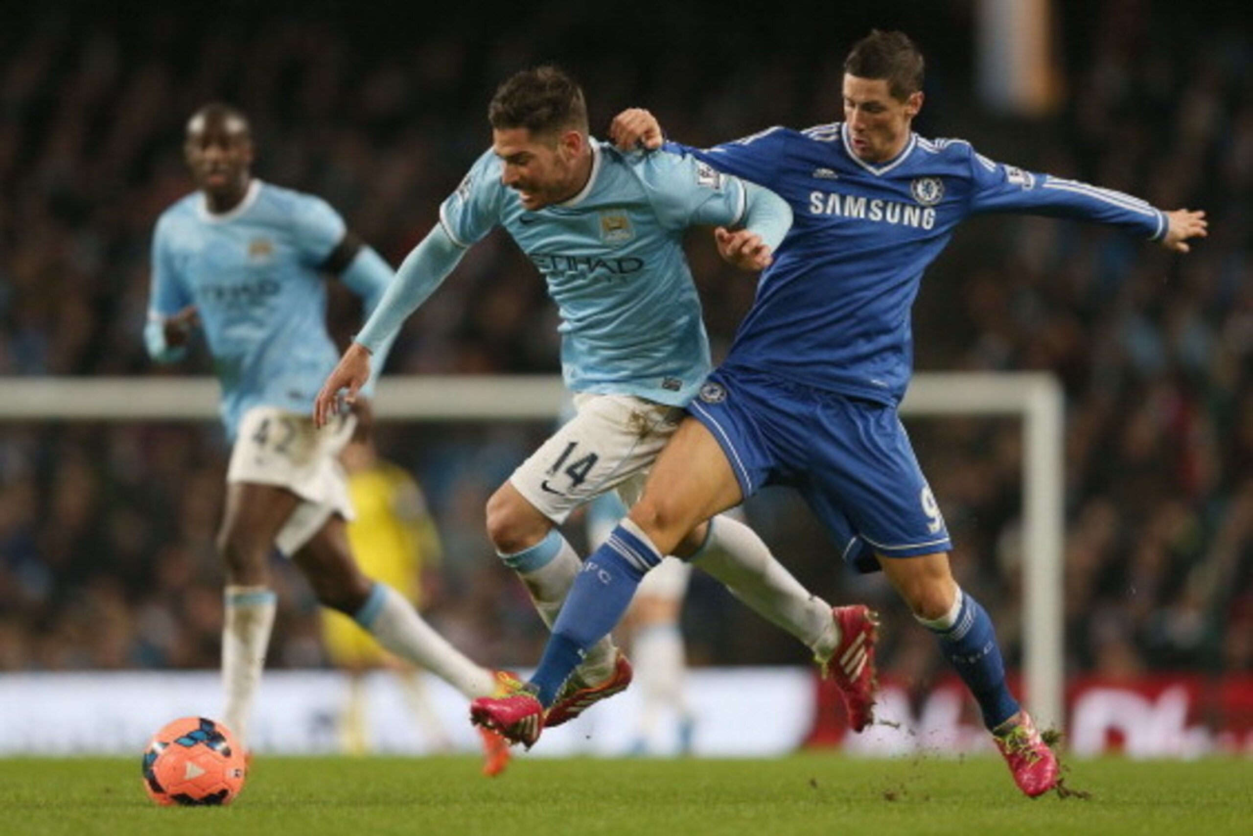 MANCHESTER, ENGLAND - FEBRUARY 15: Fernando Torres of Chelsea in action with Javi Garcia of Manchester City during the FA Cup Fifth Round match sponsored by Budweiser between Manchester City and Chelsea at Etihad Stadium on February 15, 2014 in Manchester