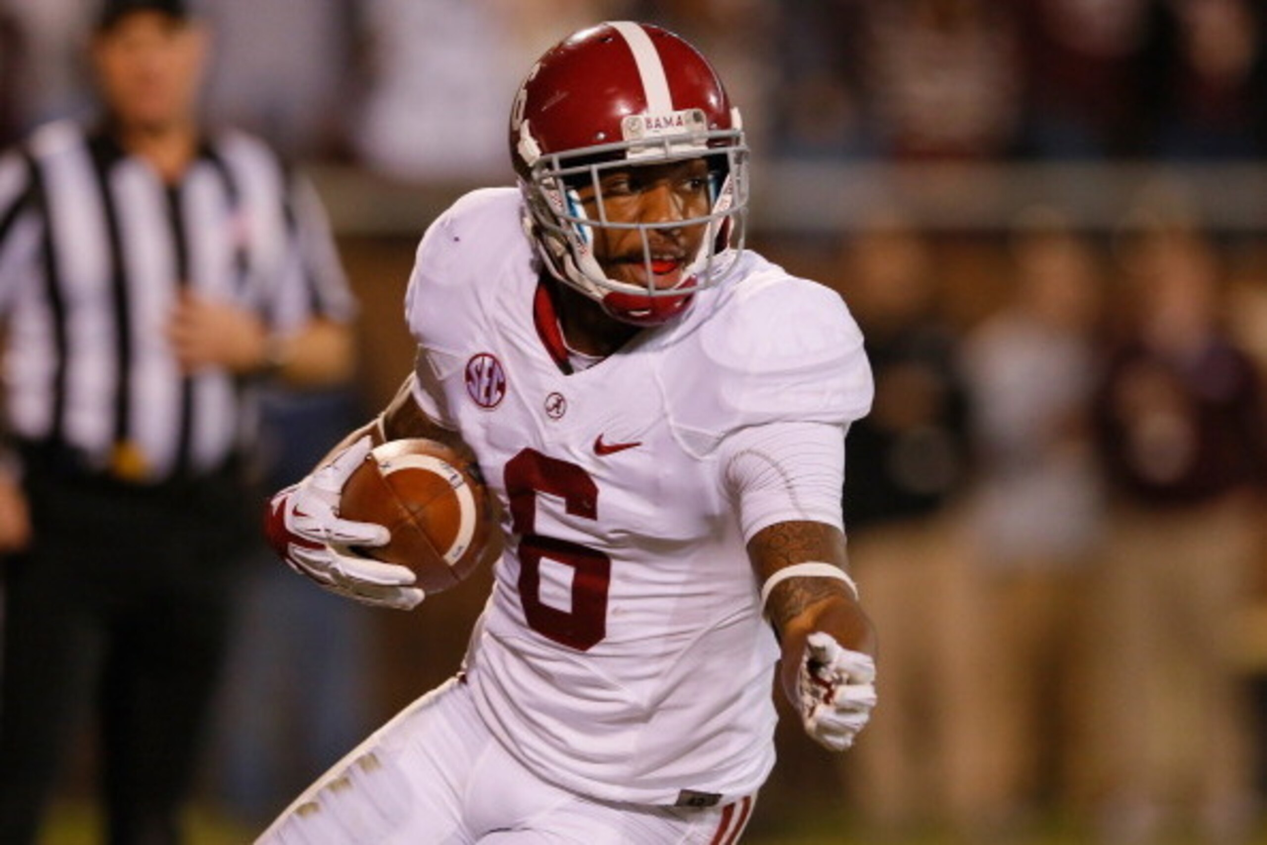 STARKVILLE, MS - NOVEMBER 16:  Ha Ha Clinton-Dix #6 of the Alabama Crimson Tide intercepts a touchdown reception intended for Jameon Lewis #4 of the Mississippi State Bulldogs at Davis Wade Stadium on November 16, 2013 in Starkville, Mississippi.  (Photo 