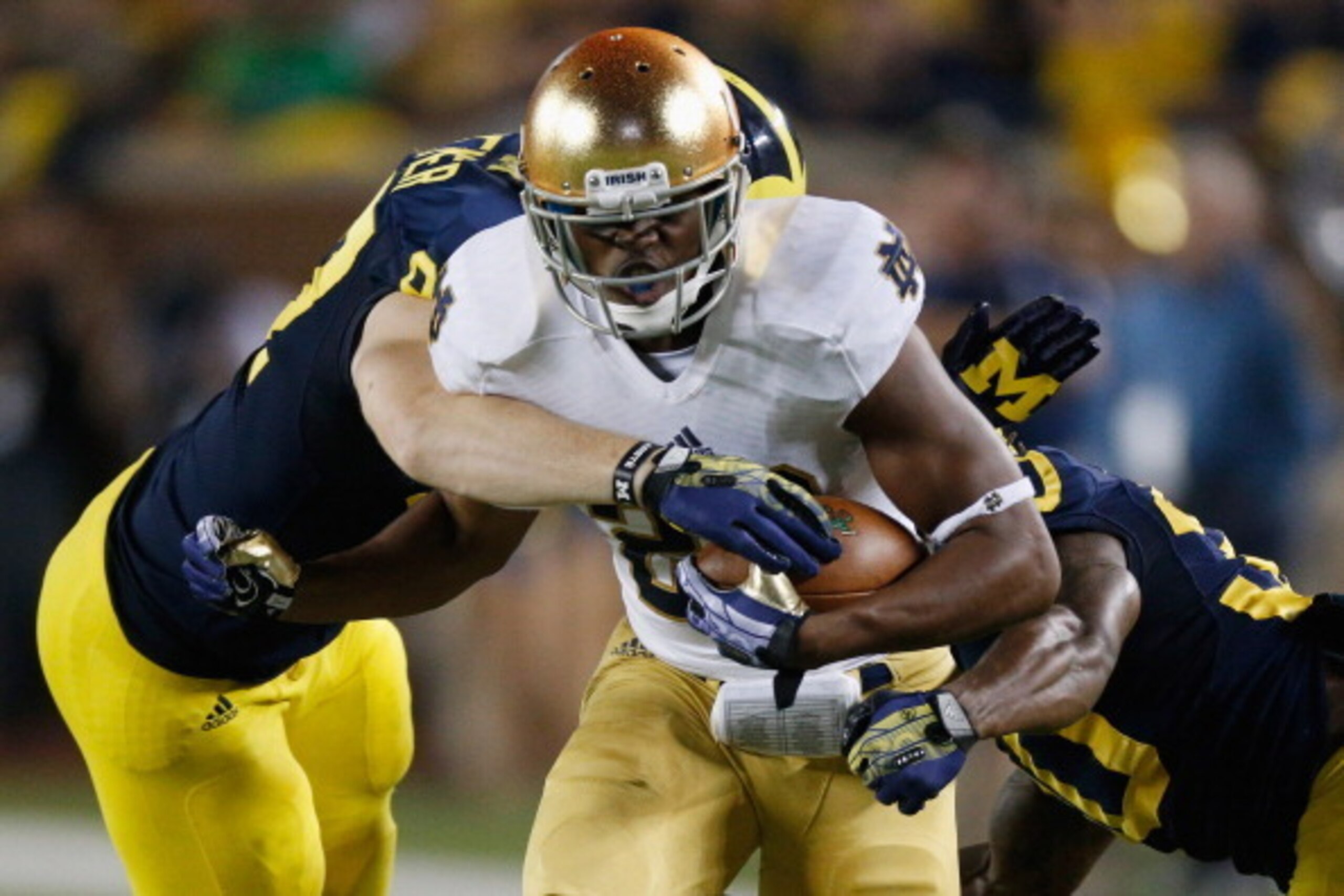 ANN ARBOR, MI - SEPTEMBER 07: C.J. Prosise #20 of the Notre Dame Fighting Irish runs the ball against the Michigan Wolverines during the game at Michigan Stadium on September 7, 2013 in Ann Arbor, Michigan.  (Photo by Gregory Shamus/Getty Images)