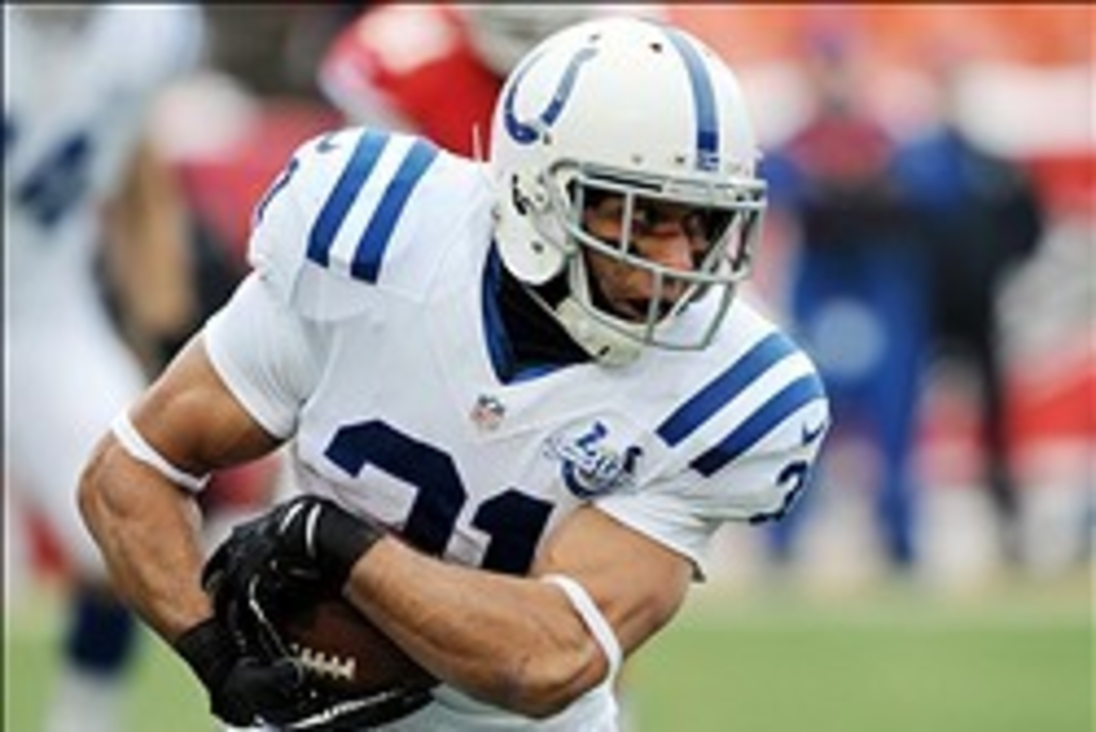 Dec 22, 2013; Kansas City, MO, USA; Indianapolis Colts running back Donald Brown (31) runs the ball during the first half of the game against the Kansas City Chiefs at Arrowhead Stadium. Mandatory Credit: Denny Medley-USA TODAY Sports