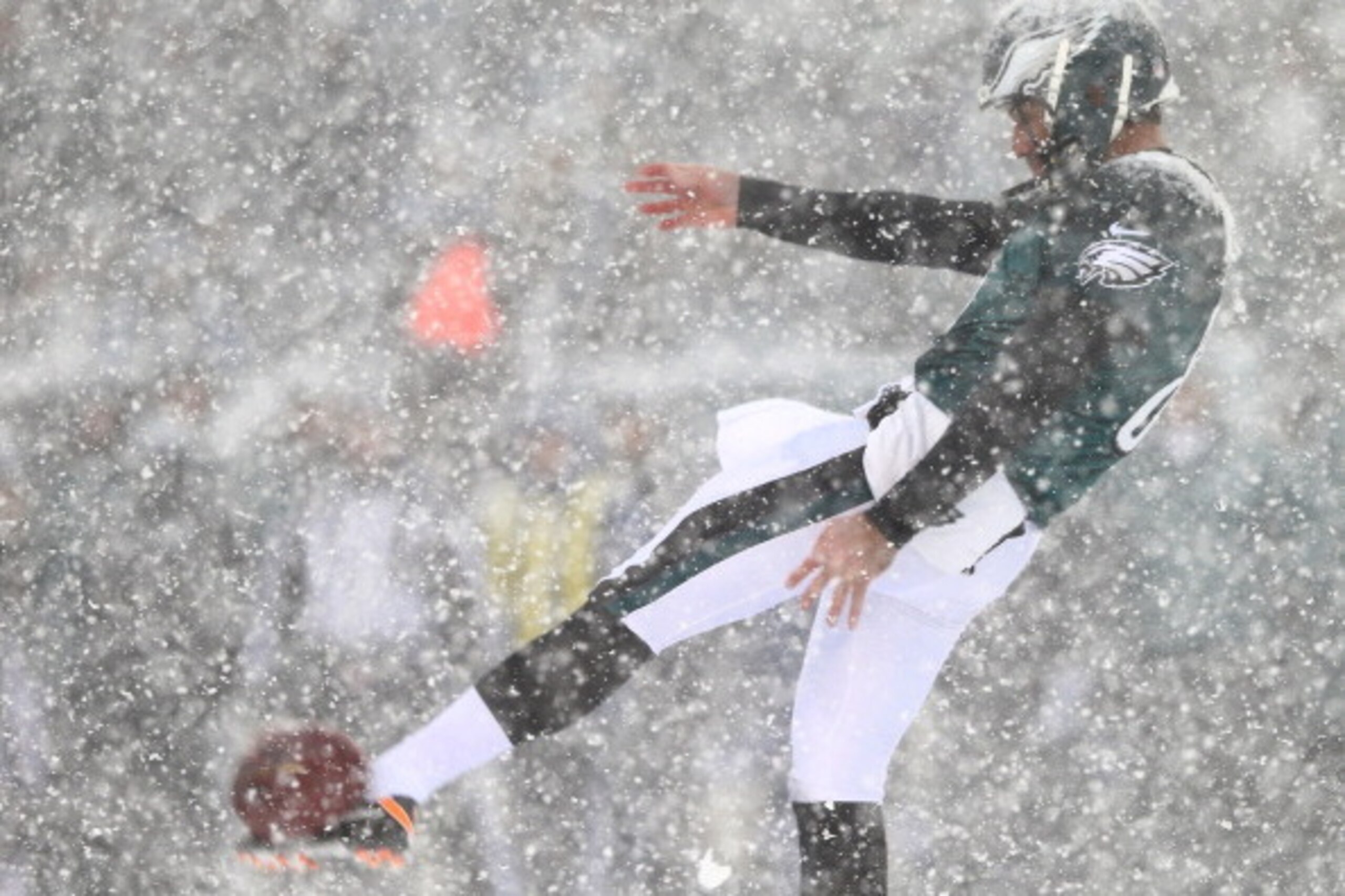 PHILADELPHIA, PA - DECEMBER 08:  Donnie Jones #8 of the Philadelphia Eagles punts the ball in the first quarter against the Detroit Lions on December 8, 2013 at Lincoln Financial Field in Philadelphia, Pennsylvania.  (Photo by Elsa/Getty Images)