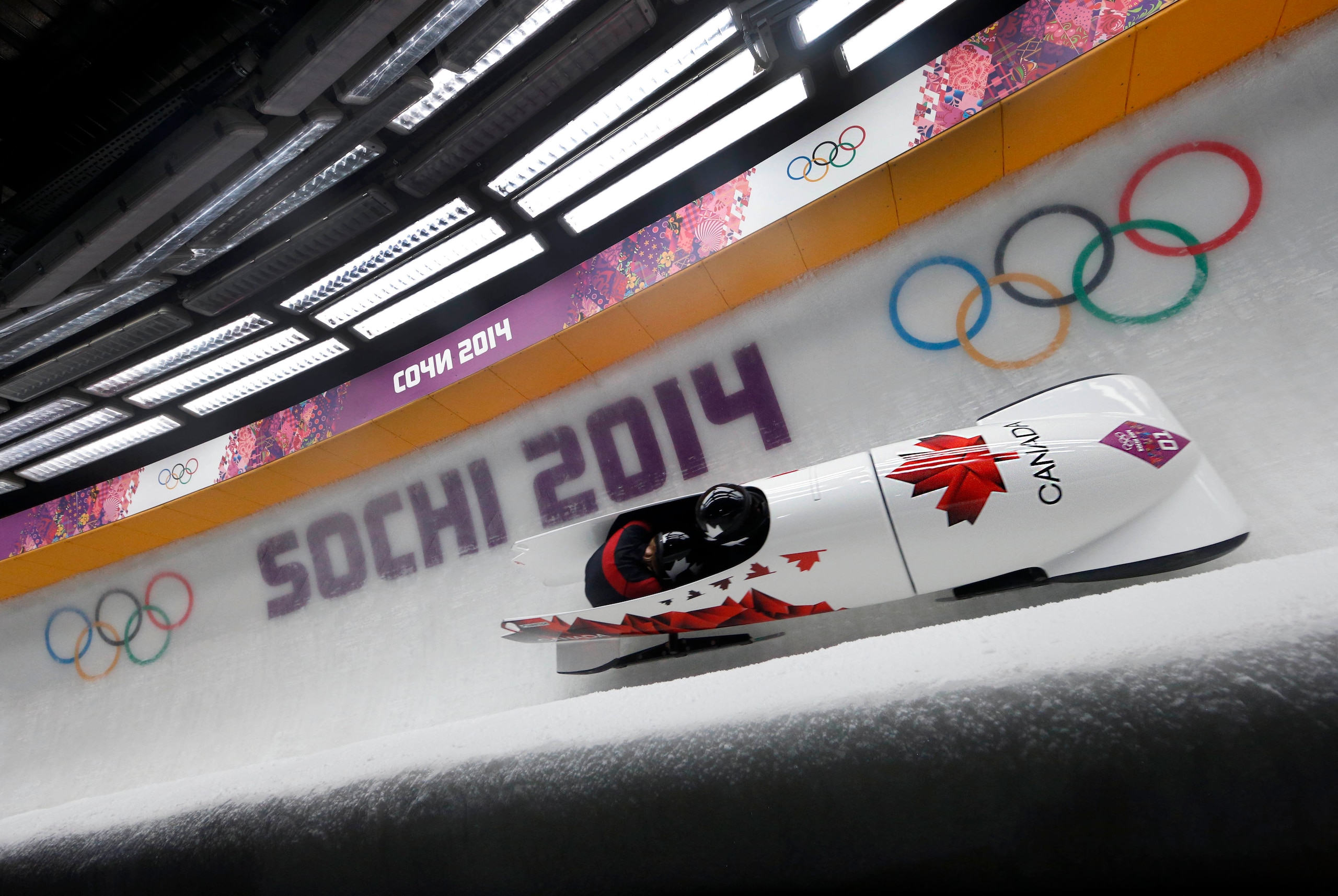 Feb 18, 2014; Krasnaya Polyana, RUSSIA; Team CAN 1 piloted by Kaillie Humphries and Heather Moyse on their first run in the women's bobsleigh during the Sochi 2014 Olympic Winter Games at Sanki Sliding Center. Mandatory Credit: Kevin Jairaj-USA TODAY Spor