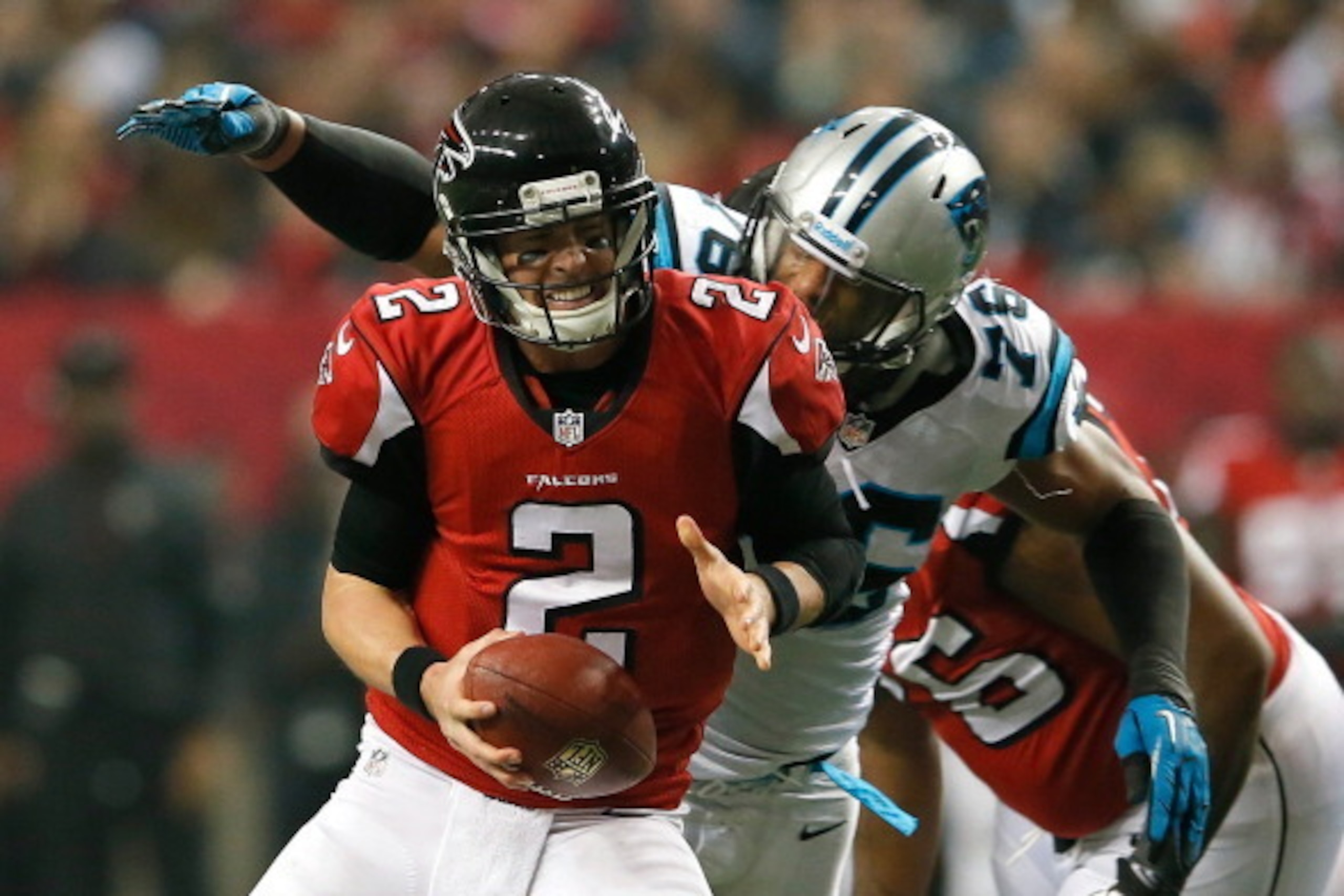ATLANTA, GA - DECEMBER 29:  Greg Hardy #76 of the Carolina Panthers pressures Matt Ryan #2 of the Atlanta Falcons at Georgia Dome on December 29, 2013 in Atlanta, Georgia.  (Photo by Kevin C. Cox/Getty Images)