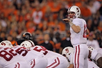 GLENDALE, AZ - JANUARY 02:  Andrew Luck #12 of the Stanford Cardinal gestures at the line against the Oklahoma State Cowboys during the Tostitos Fiesta Bowl on January 2, 2012 at University of Phoenix Stadium in Glendale, Arizona.  (Photo by Doug Pensinge