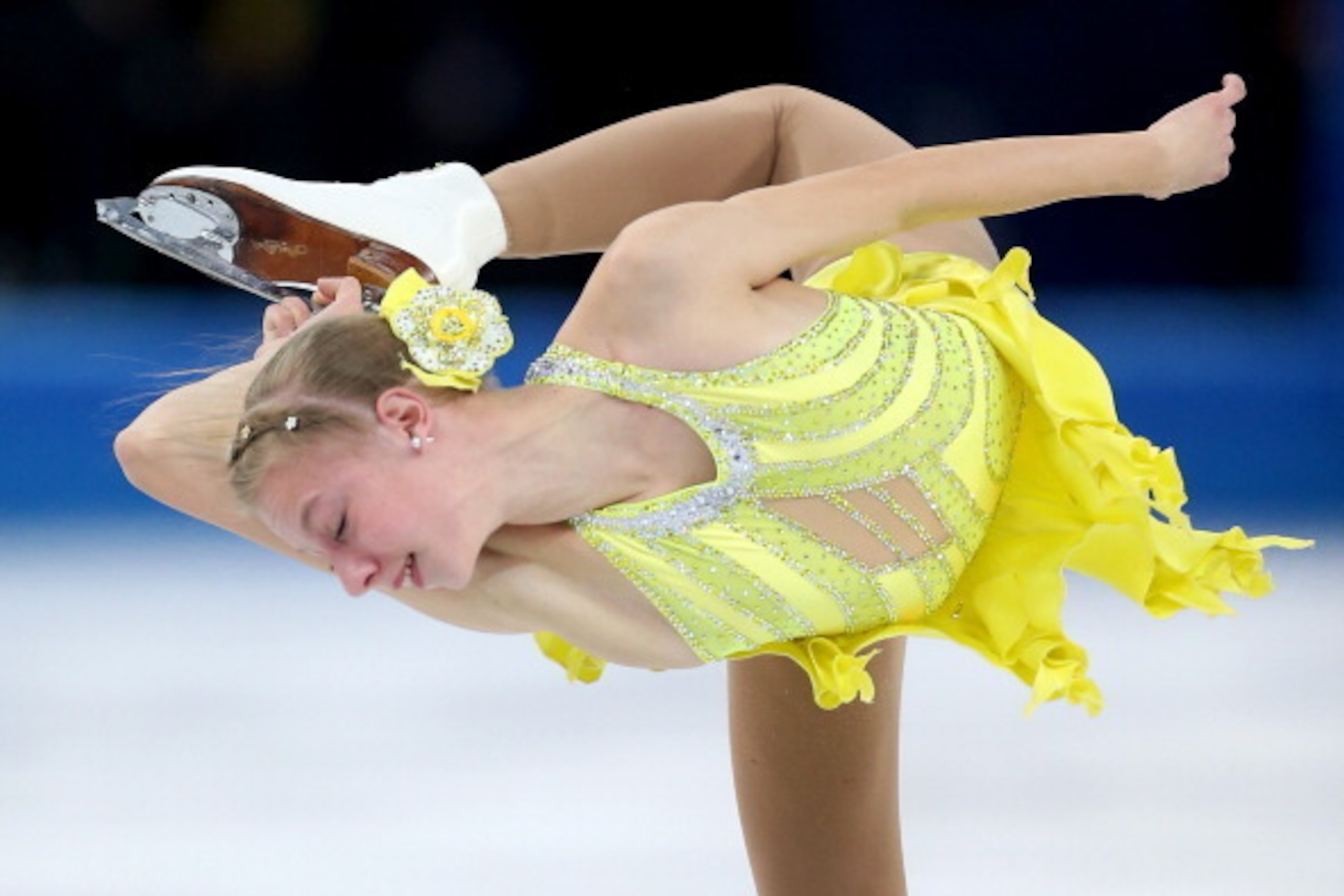 SOCHI, RUSSIA - FEBRUARY 19:  Polina Edmunds of the United States competes in the Figure Skating Ladies' Short Program on day 12 of the Sochi 2014 Winter Olympics at Iceberg Skating Palace on February 19, 2014 in Sochi, Russia.  (Photo by Matthew Stockman