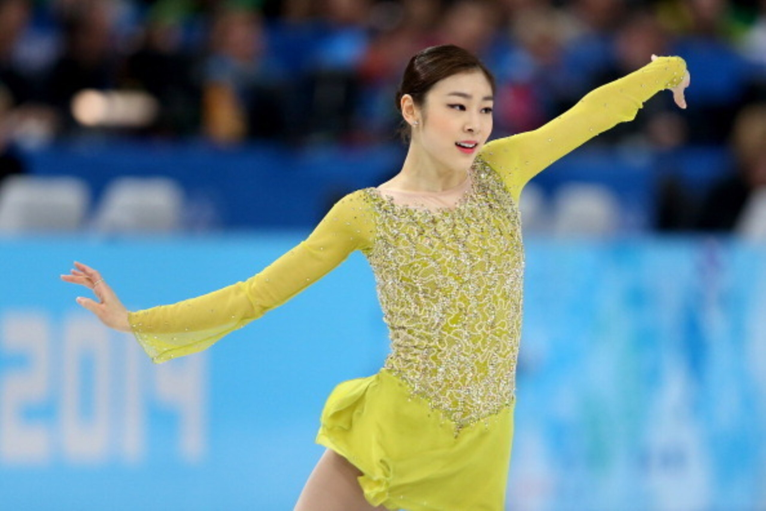 SOCHI, RUSSIA - FEBRUARY 19:  Yuna Kim of South Korea competes in the Figure Skating Ladies' Short Program on day 12 of the Sochi 2014 Winter Olympics at Iceberg Skating Palace on February 19, 2014 in Sochi, Russia.  (Photo by Matthew Stockman/Getty Image