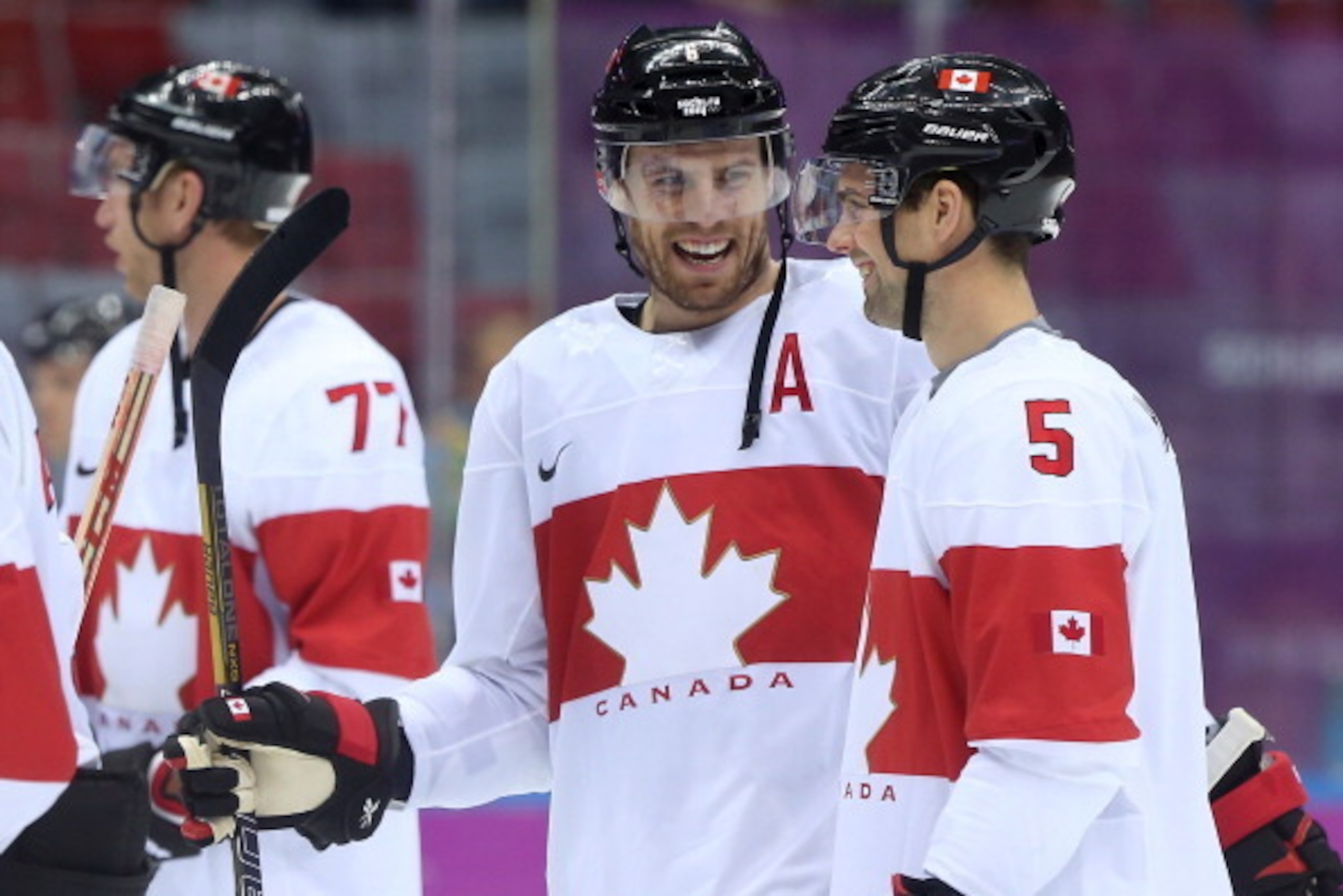 SOCHI, RUSSIA - FEBRUARY 19:  Shea Weber #6 and Dan Hamhuis #5 of Canada celebrate after defeating Latvia 2-1 during the Men's Ice Hockey Quarterfinal Playoff on Day 12 of the 2014 Sochi Winter Olympics at Bolshoy Ice Dome on February 19, 2014 in Sochi, R