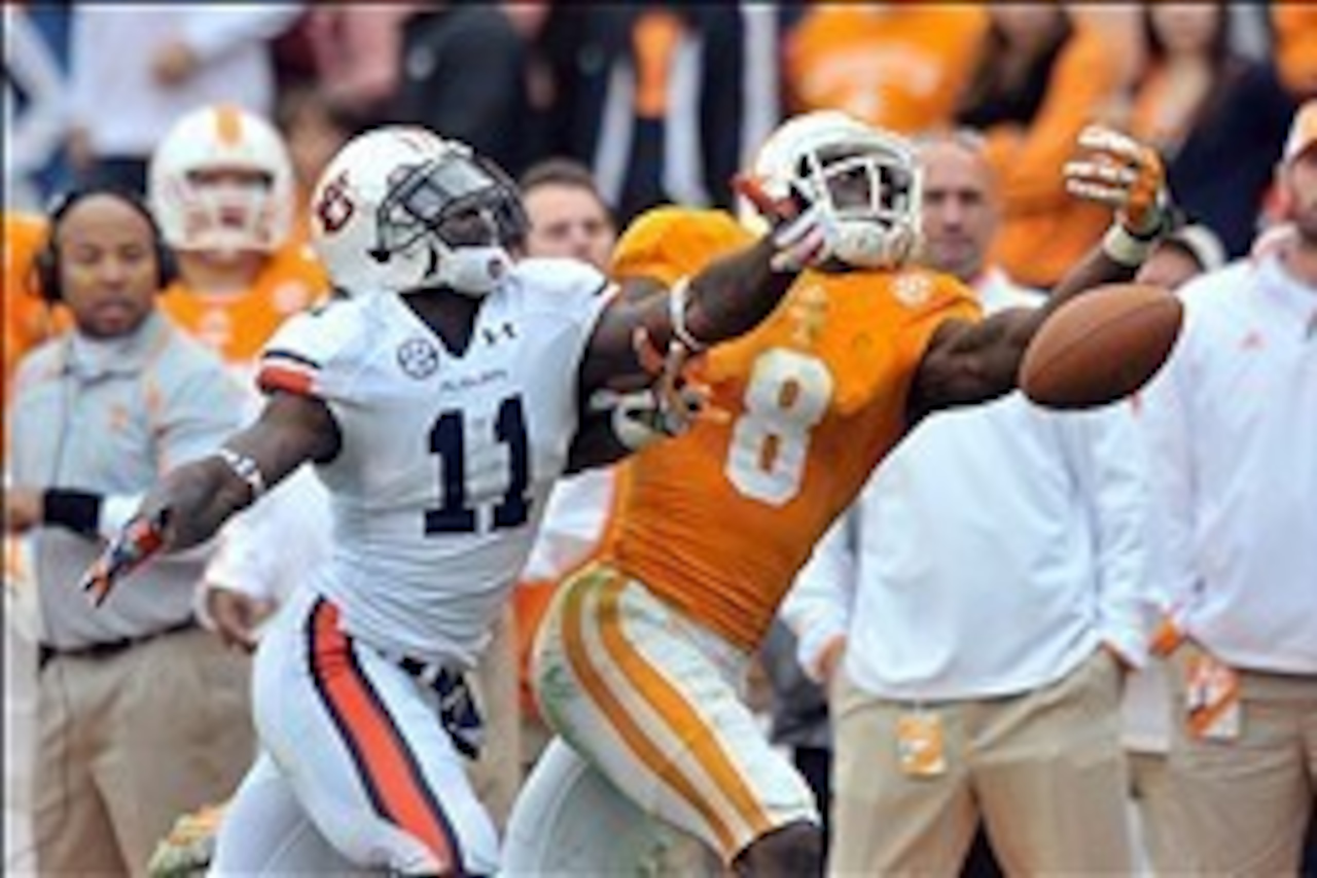 Nov 9, 2013; Knoxville, TN, USA; Auburn Tigers cornerback Chris Davis (11) breaks up a pass intended for Tennessee Volunteers wide receiver Marquez North (8) during the first half at Neyland Stadium. Mandatory Credit: Jim Brown-USA TODAY Sports
