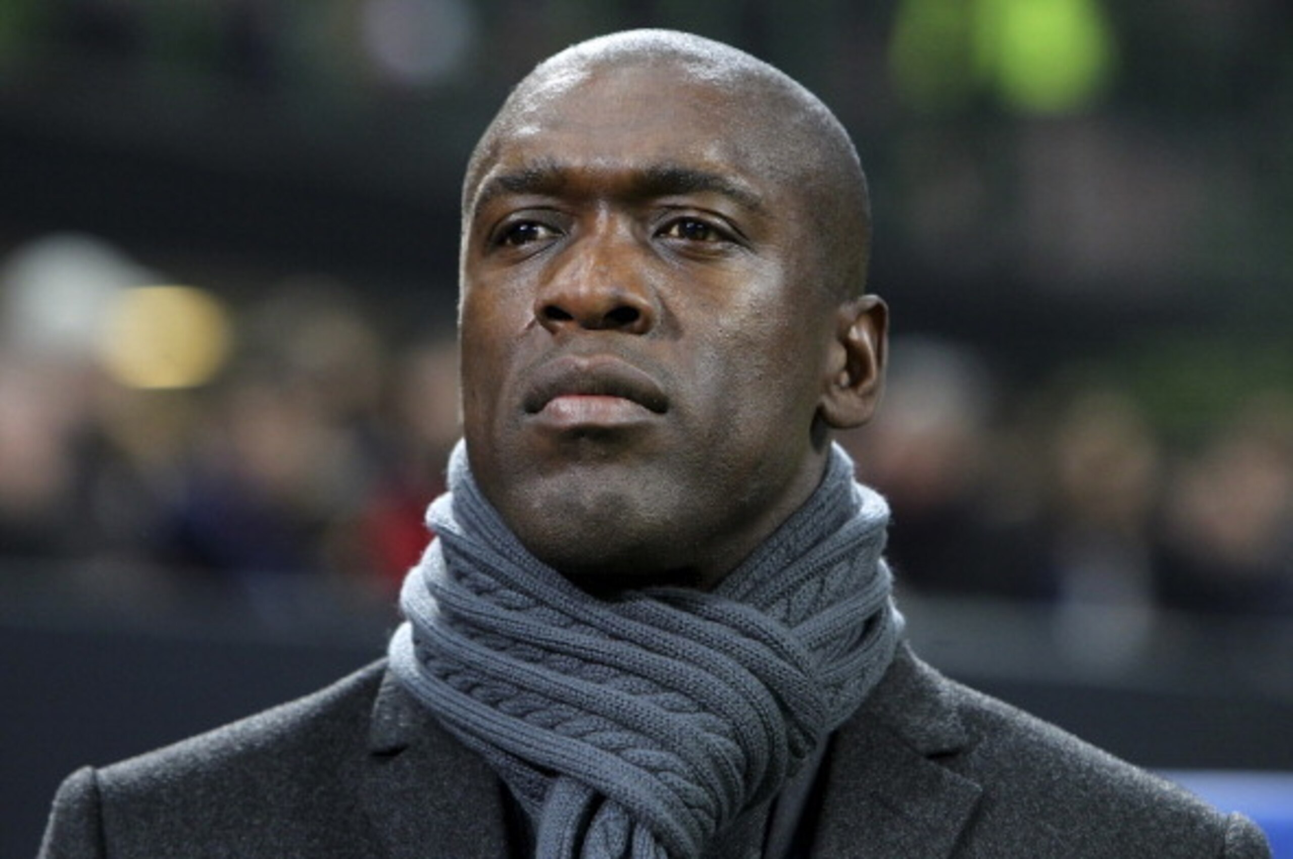 MILAN, ITALY - FEBRUARY 19: AC Milan coach Clarence Seedorf looks on before the UEFA Champions League Round of 16 match between AC Milan and Club Atletico de Madrid at Stadio Giuseppe Meazza on February 19, 2014 in Milan, Italy. (Photo by Marco Luzzani/ MILAN, ITALY - FEBRUARY 19: AC Milan coach Clarence Seedorf looks on before the UEFA Champions League Round of 16 match between AC Milan and Club Atletico de Madrid at Stadio Giuseppe Meazza on February 19, 2014 in Milan, Italy. (Photo by Marco Luzzani/