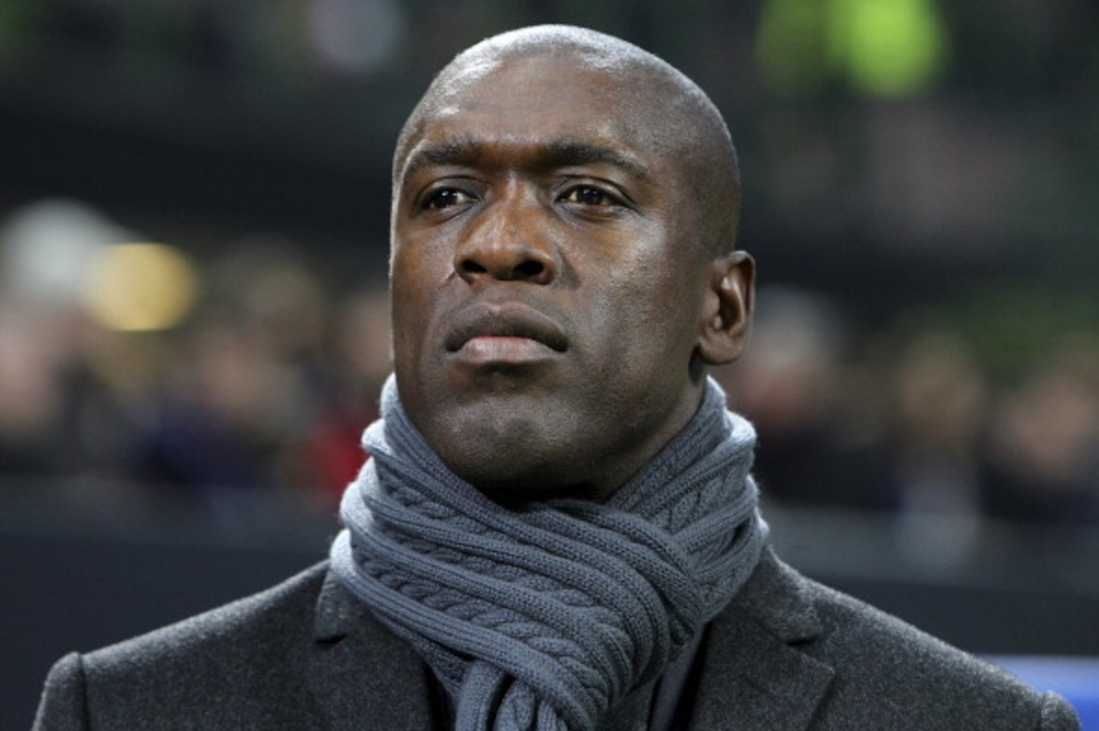 MILAN, ITALY - FEBRUARY 19:  AC Milan coach Clarence Seedorf looks on before the UEFA Champions League Round of 16 match between AC Milan and Club Atletico de Madrid at Stadio Giuseppe Meazza on February 19, 2014 in Milan, Italy.  (Photo by Marco Luzzani/