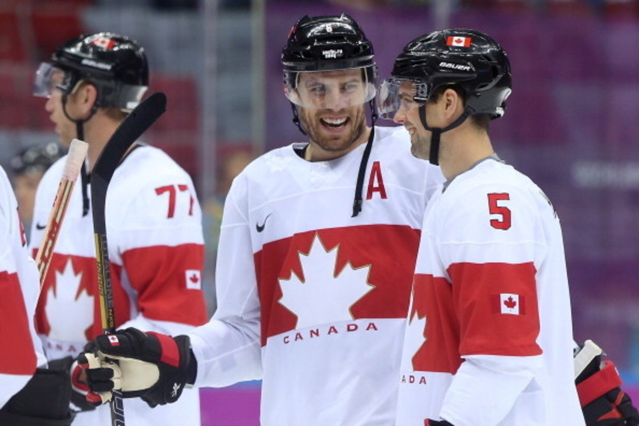 SOCHI, RUSSIA - FEBRUARY 19:  Shea Weber #6 and Dan Hamhuis #5 of Canada celebrate after defeating Latvia 2-1 during the Men's Ice Hockey Quarterfinal Playoff on Day 12 of the 2014 Sochi Winter Olympics at Bolshoy Ice Dome on February 19, 2014 in Sochi, R