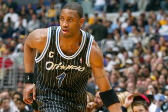 LOS ANGELES - MARCH 15:  Tracy McGrady #1 of the Orlando Magic drives upcourt during the game against the Los Angeles Lakers at Staples Center on March 15, 2004 in Los Angeles, California.  The Lakers won 113-110.   NOTE TO USER: User expressly acknowledg