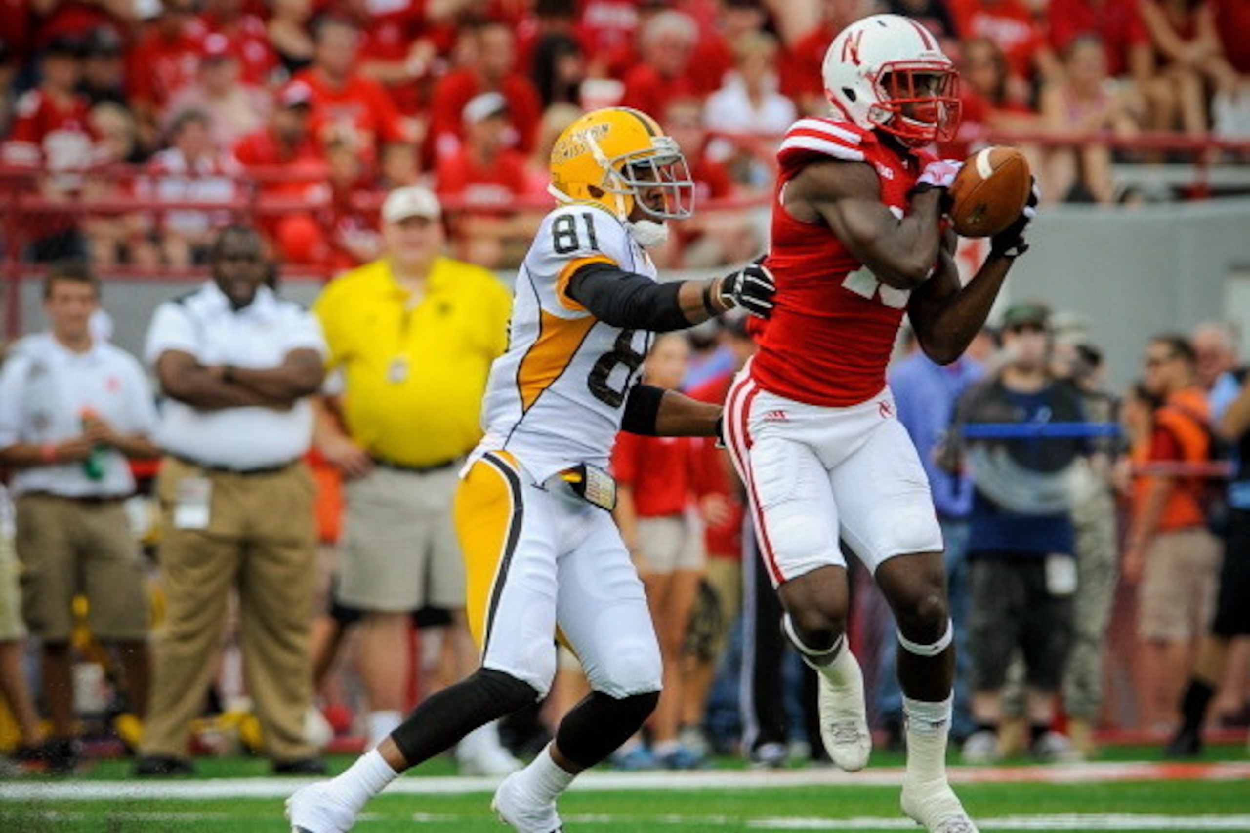 LINCOLN, NE - SEPTEMBER 7: Cornerback Stanley Jean-Baptiste #16 of the Nebraska Cornhuskers takes the pass away from wide receiver Rickey Bradley #81 of the Southern Miss Golden Eagles at Memorial Stadium on September 7, 2013 in Lincoln, Nebraska. (Photo 