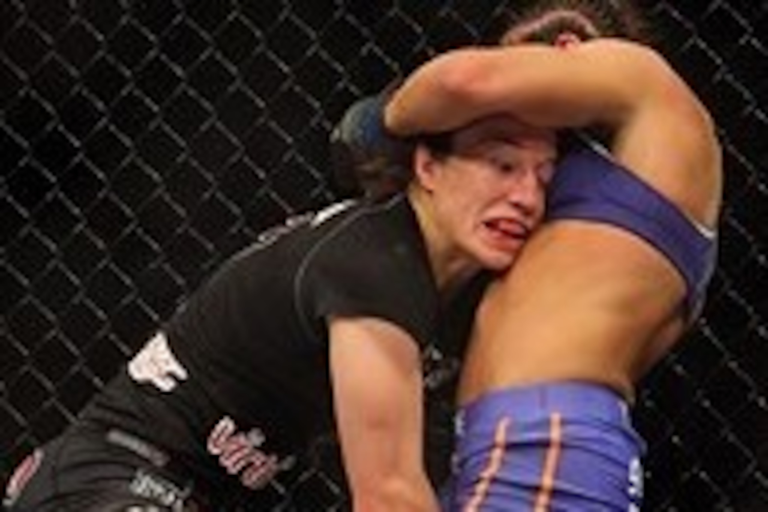 Apr 27, 2013; Newark, NJ, USA; Sara McMann (black shorts) competes against Sheila Gaff (blue shorts) during UFC 159 at the Prudential Center. Mandatory Credit: Brad Penner-USA TODAY Sports