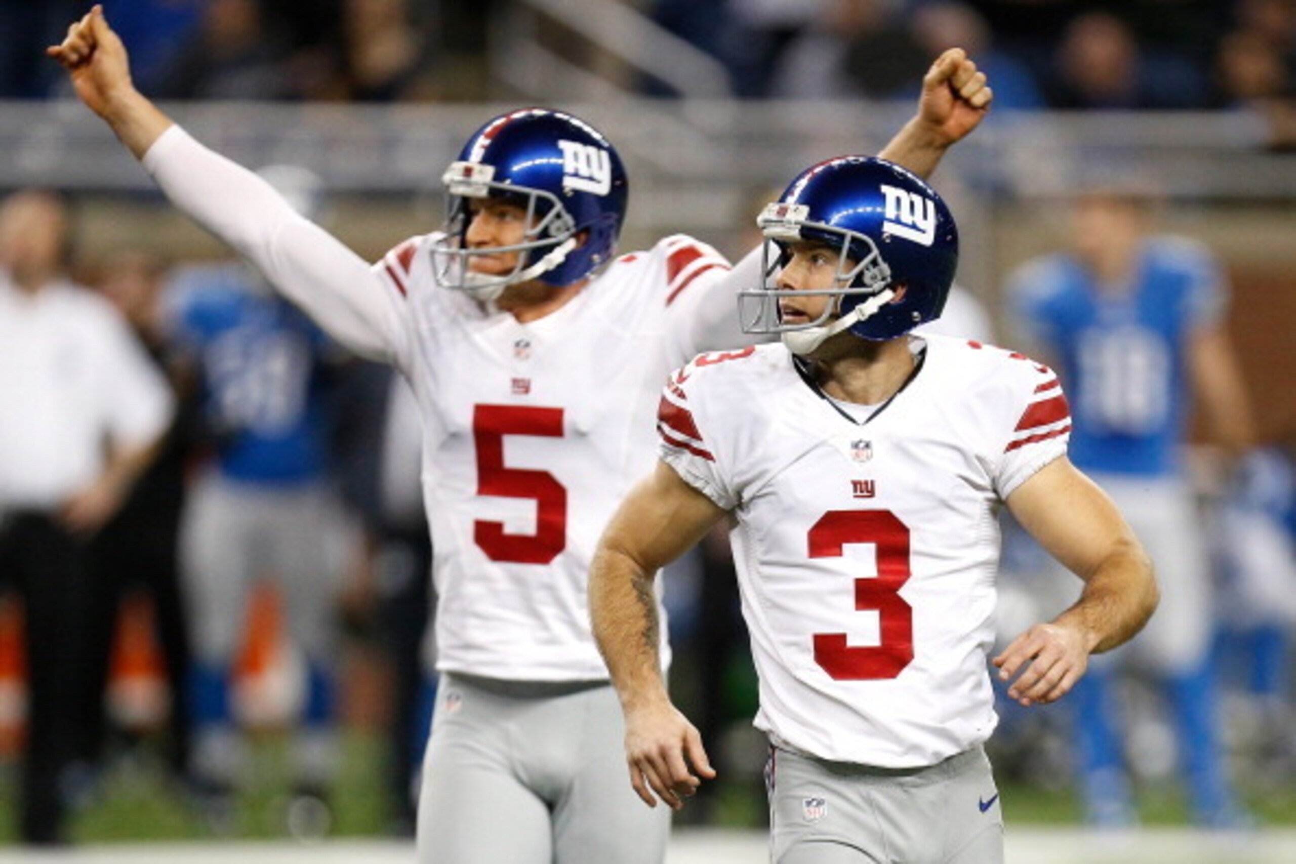 DETROIT, MI - DECEMBER 22: Josh Brown #3 of the New York Giants watches his overtime game winning filed goal to beat the Detroit Lions 23-20 with Steve Weatherford #5 while playing the Detroit Lions at Ford Field on December 22, 2013 in Detroit, Michigan.