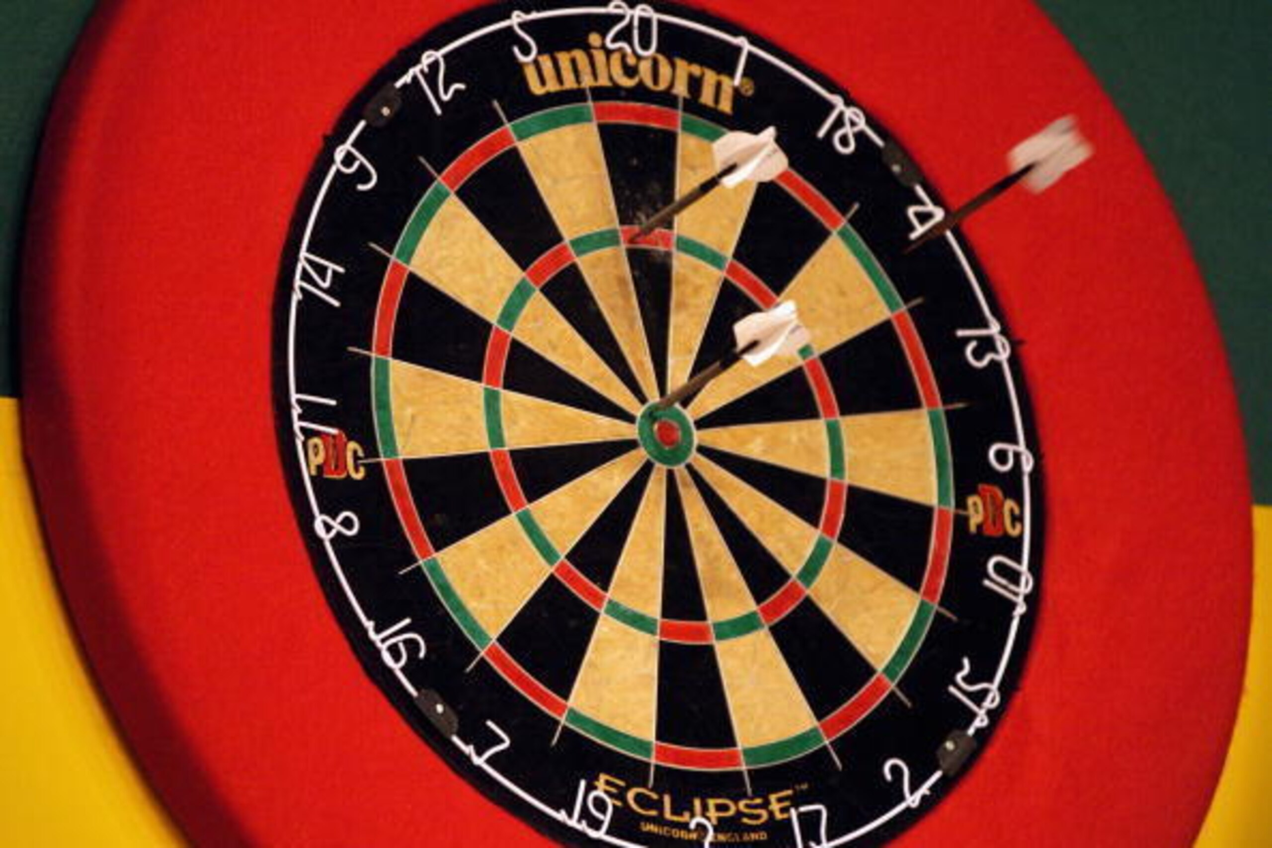 BLACKPOOL, ENGLAND - JULY 25:  Darts are seen bedded in the board during the first day of the Stan James World Match Play Darts Championships at Winter Gardens on July 25, 2004 in Blackpool, England.  (Photo by Matthew Lewis/Getty Images)