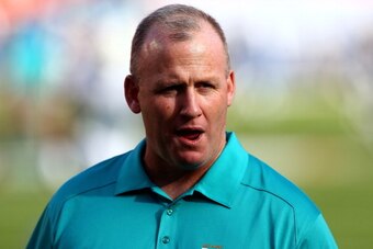 MIAMI GARDENS, FL - NOVEMBER 17:  Offensive line coach, Jim Turner, of the Miami Dolphins coaches his players before their game against the San Diego Chargers at Sun Life Stadium on November 17, 2013 in Miami Gardens, Florida.  (Photo by Streeter Lecka/Ge