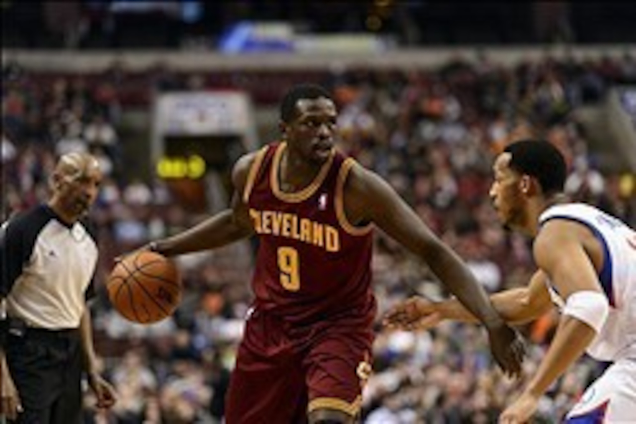 Feb 18, 2014; Philadelphia, PA, USA; Cleveland Cavaliers forward Luol Deng (9) is defended by Philadelphia 76ers guard Evan Turner (12) during the first quarter at the Wells Fargo Center. The Cavaliers defeated the Sixers 114-85. Mandatory Credit: Howard Feb 18, 2014; Philadelphia, PA, USA; Cleveland Cavaliers forward Luol Deng (9) is defended by Philadelphia 76ers guard Evan Turner (12) during the first quarter at the Wells Fargo Center. The Cavaliers defeated the Sixers 114-85. Mandatory Credit: Howard