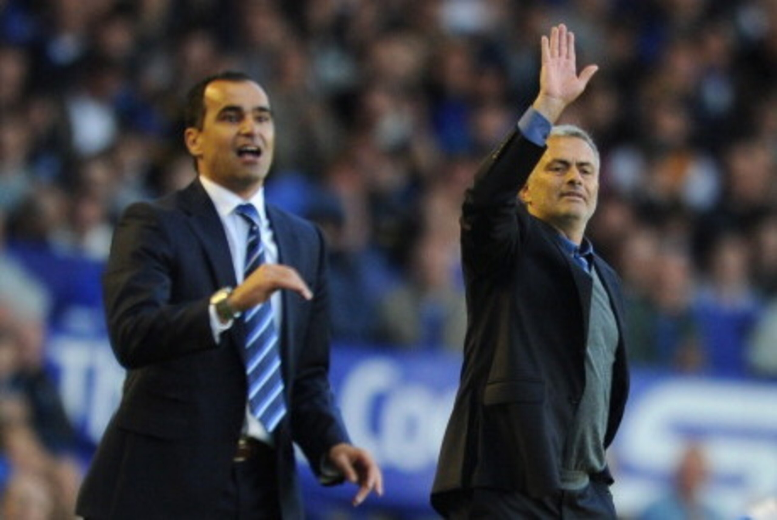 LIVERPOOL, ENGLAND - SEPTEMBER 14:  Chelsea Manager Jose Mourinho and Everton Manager Roberto Martinez (L) react during the Barclays Premier League match between Everton and Chelsea at Goodison Park on September 14, 2013 in Liverpool, England.  (Photo by 