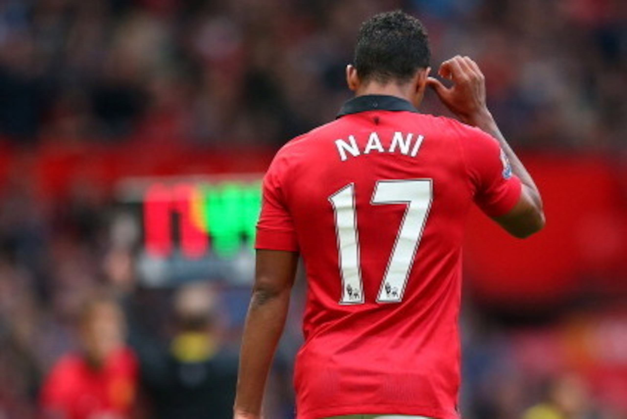 MANCHESTER, ENGLAND - OCTOBER 26:  Nani of Manchester United walks off the pitch as his number is shown for his substitution during the Barclays Premier League match between Manchester United and Stoke City at Old Trafford on October 26, 2013 in Mancheste