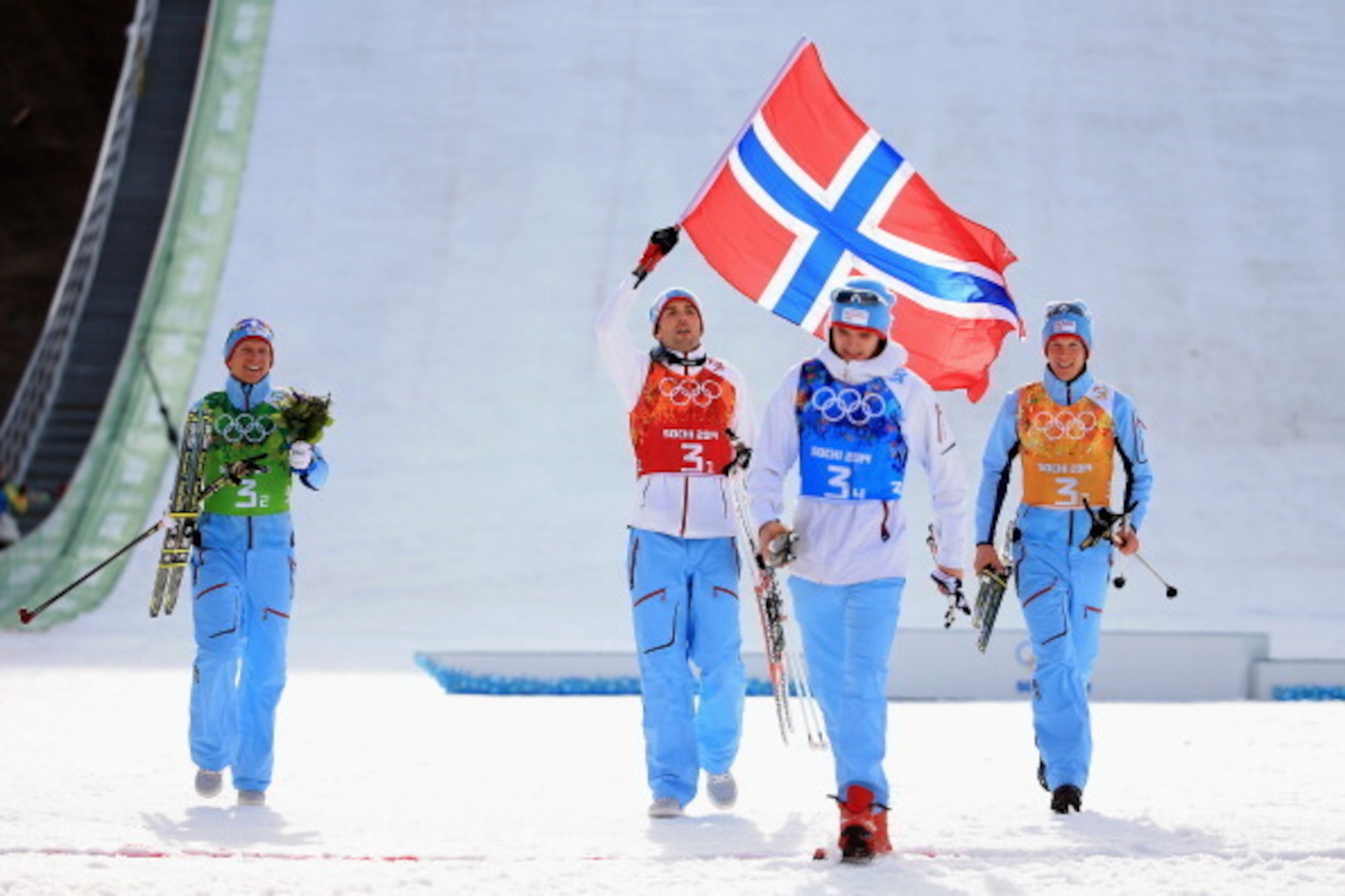 SOCHI, RUSSIA - FEBRUARY 20: Gold medalists Magnus Hovdal Moan, Haavard Klemetsen, Magnus Krog and Joergen Graabak of Norway celebrate after the Nordic Combined Men's Team 4 x 5 km during day 13 of the Sochi 2014 Winter Olympics at RusSki Gorki Jumping C SOCHI, RUSSIA - FEBRUARY 20: Gold medalists Magnus Hovdal Moan, Haavard Klemetsen, Magnus Krog and Joergen Graabak of Norway celebrate after the Nordic Combined Men's Team 4 x 5 km during day 13 of the Sochi 2014 Winter Olympics at RusSki Gorki Jumping C
