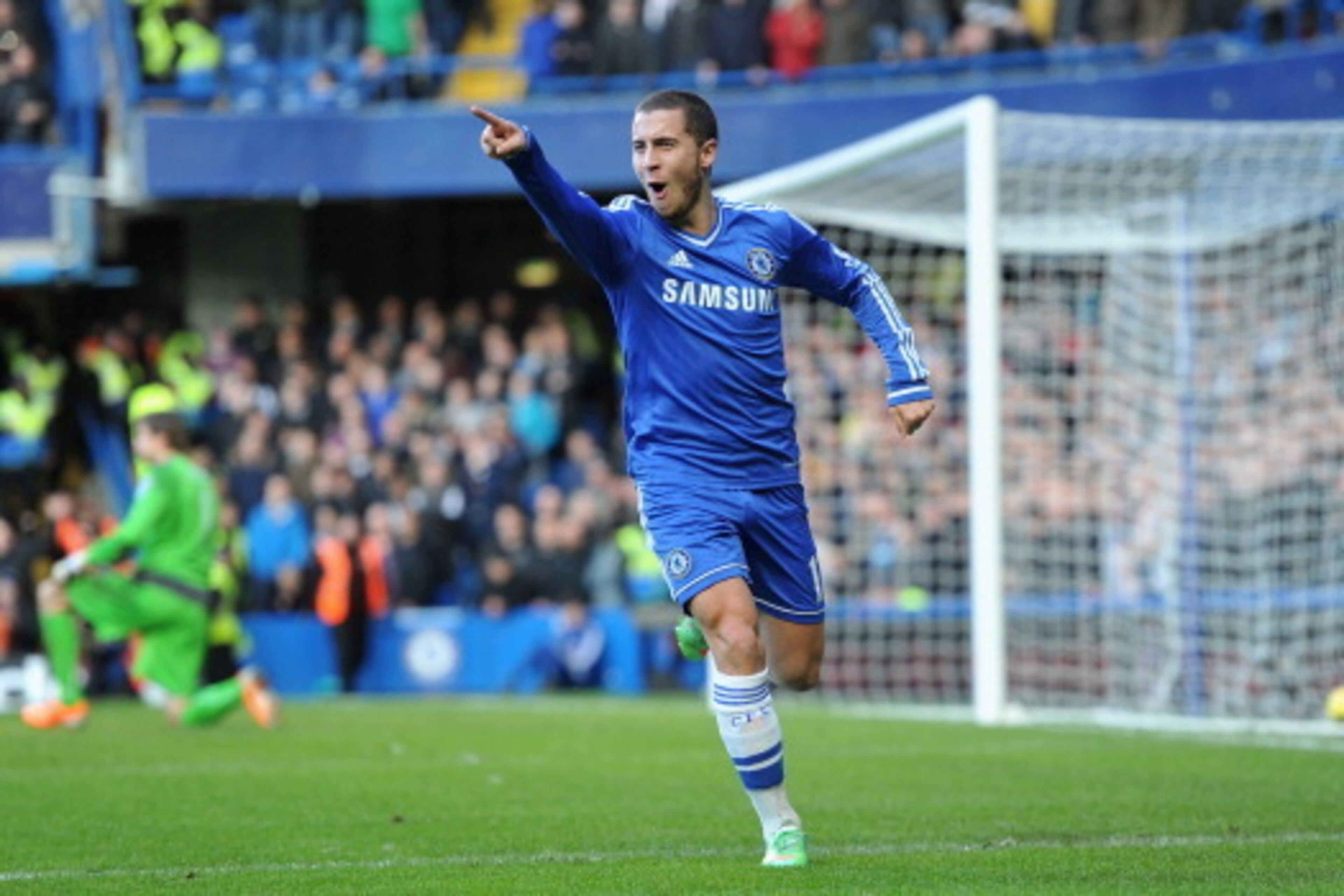 LONDON, ENGLAND - FEBRUARY 08:  Eden Hazard of Chelsea celebrates after scoring his first goal during the Barclays Premier League match between Chelsea and Newcastle United at Stamford Bridge on February 8, 2014 in London, England.  (Photo by Mike Hewitt/