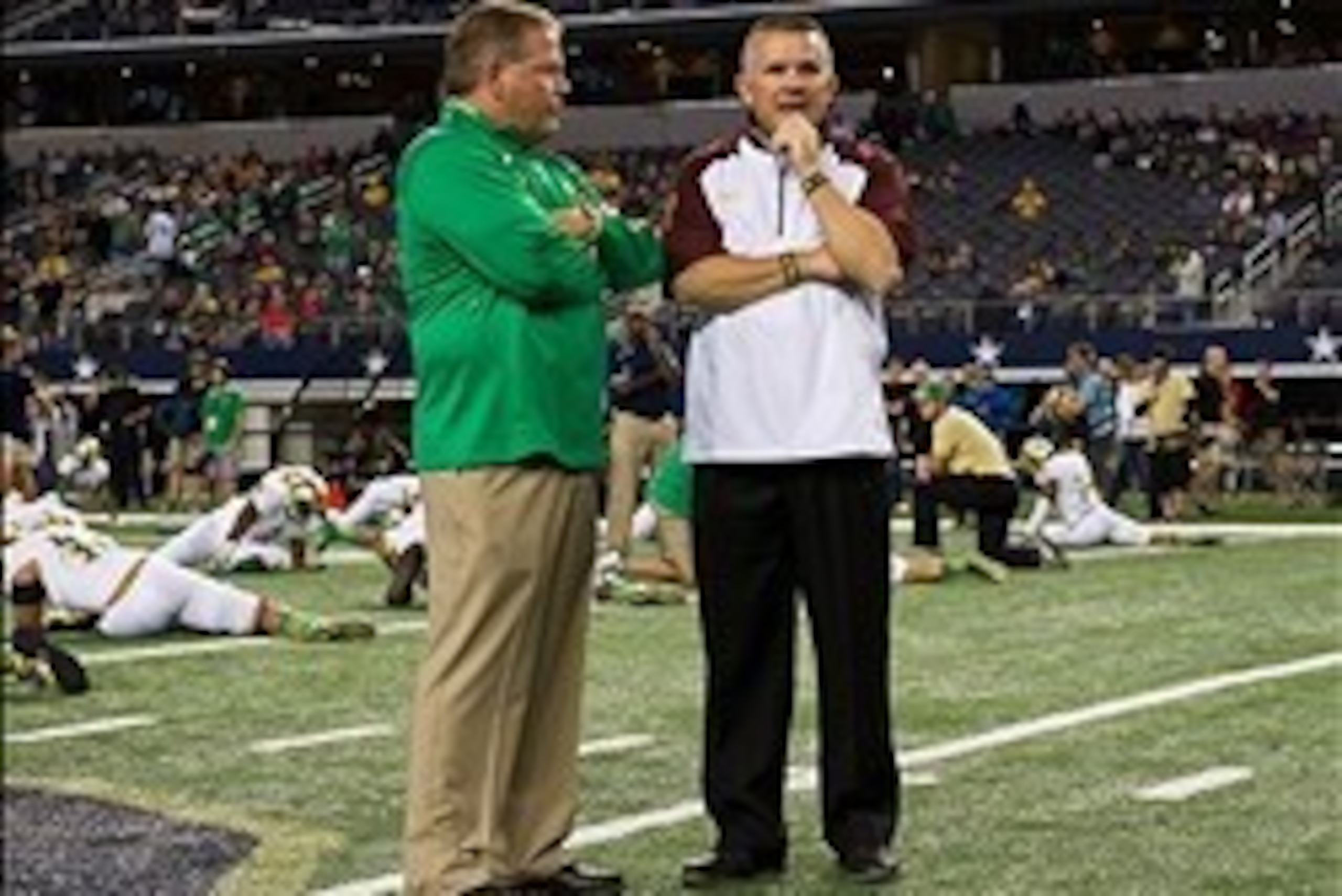 Oct 5, 2013; Arlington, TX, USA; Notre Dame Fighting Irish head coach Brian Kelly and Arizona State Sun Devils head coach Todd Graham chat before the game at AT&T Stadium. Mandatory Credit: Matt Cashore-USA TODAY Sports