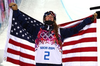 SOCHI, RUSSIA - FEBRUARY 20:  Maddie Bowman of the United States celebrates winning the gold medal in the Freestyle Skiing Ladies' Ski Halfpipe Finals on day thirteen of the 2014 Winter Olympics at Rosa Khutor Extreme Park on February 20, 2014 in Sochi, R