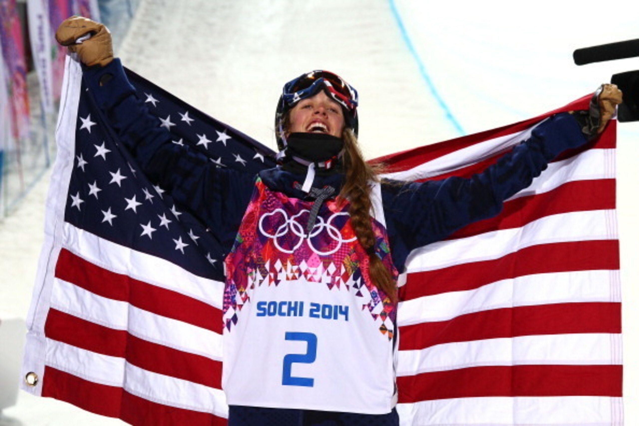 SOCHI, RUSSIA - FEBRUARY 20:  Maddie Bowman of the United States celebrates winning the gold medal in the Freestyle Skiing Ladies' Ski Halfpipe Finals on day thirteen of the 2014 Winter Olympics at Rosa Khutor Extreme Park on February 20, 2014 in Sochi, R