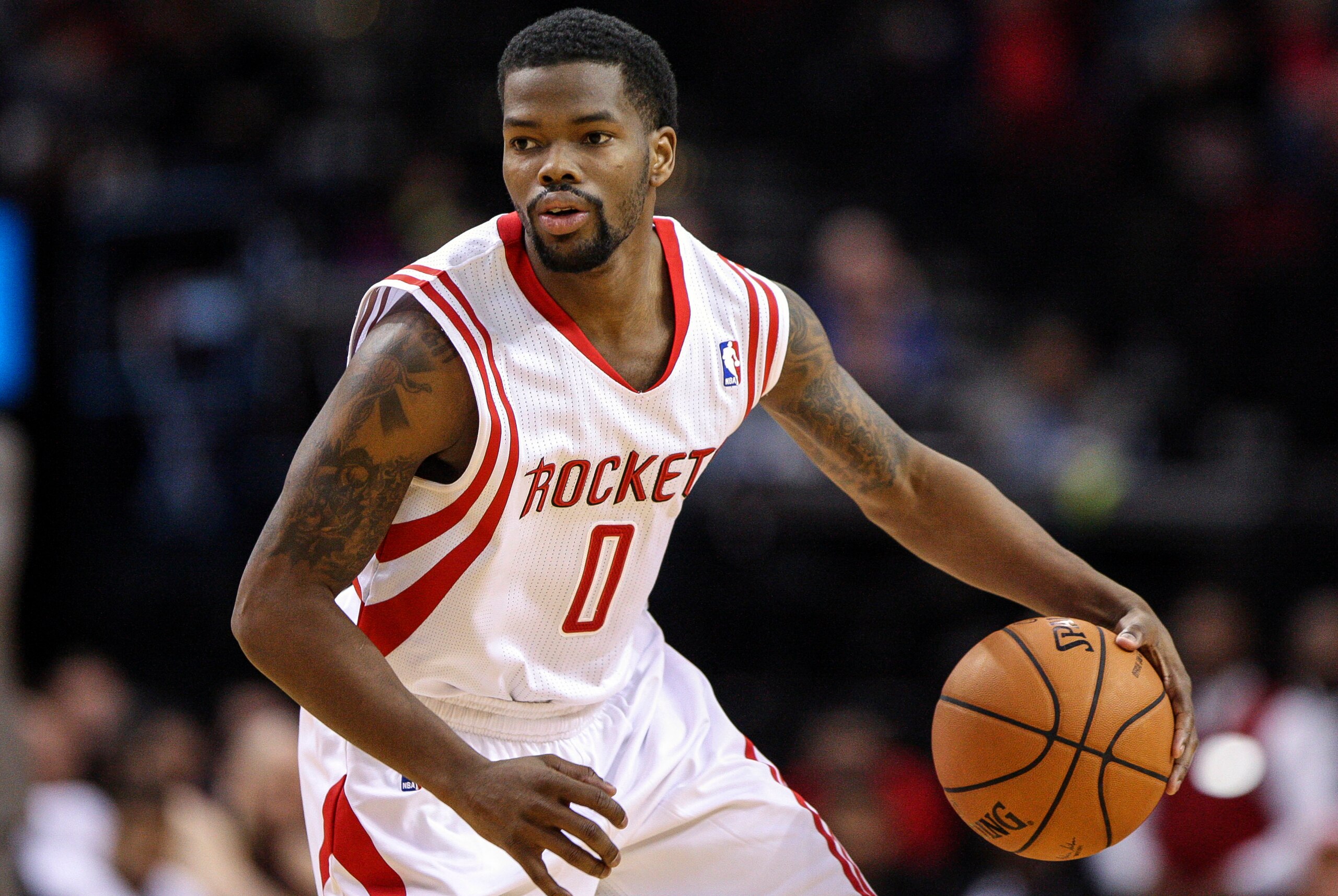 Feb 12, 2014; Houston, TX, USA; Houston Rockets point guard Aaron Brooks (0) controls the ball during the first quarter against the Washington Wizards at Toyota Center. Mandatory Credit: Troy Taormina-USA TODAY Sports Feb 12, 2014; Houston, TX, USA; Houston Rockets point guard Aaron Brooks (0) controls the ball during the first quarter against the Washington Wizards at Toyota Center. Mandatory Credit: Troy Taormina-USA TODAY Sports