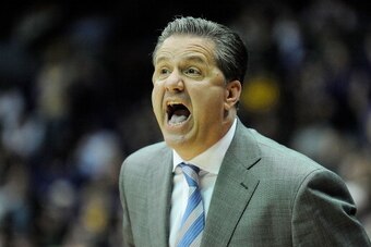 BATON ROUGE, LA - JANUARY 28:  Head coach John Calipari of the Kentucky Wildcats reacts to a called foul during a game against the LSU Tigers at the Pete Maravich Assembly Center on January 28, 2014 in Baton Rouge, Louisiana.  LSU won the game 87-82.  (Ph