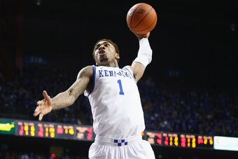 LEXINGTON, KY - JANUARY 18:  James Young #1 of the Kentucky Wildcats dunks the ball during the game against the Tennessee Volunteers at Rupp Arena on January 18, 2014 in Lexington, Kentucky.  (Photo by Andy Lyons/Getty Images)