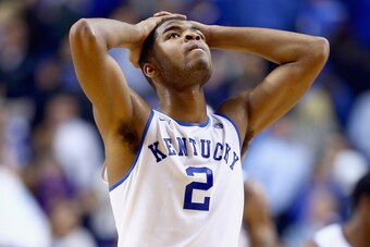 LEXINGTON, KY - FEBRUARY 15:  Aaron Harrison #2 of the Kentucky Wildcats walks off of the court after the 69-59 loss to the Florida Gators at Rupp Arena on February 15, 2014 in Lexington, Kentucky.  (Photo by Andy Lyons/Getty Images)