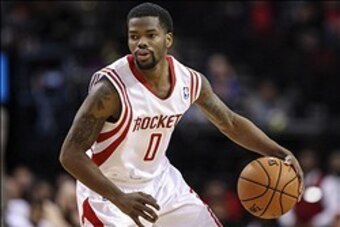 Feb 12, 2014; Houston, TX, USA; Houston Rockets point guard Aaron Brooks (0) controls the ball during the first quarter against the Washington Wizards at Toyota Center. Mandatory Credit: Troy Taormina-USA TODAY Sports