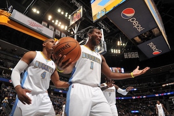 DENVER, CO - February 18: Jordan Hamilton #1 of the Denver Nuggets reacts to a call during the game against the Phoenix Suns on February 18, 2014 at the Pepsi Center in Denver, Colorado. NOTE TO USER: User expressly acknowledges and agrees that, by downlo