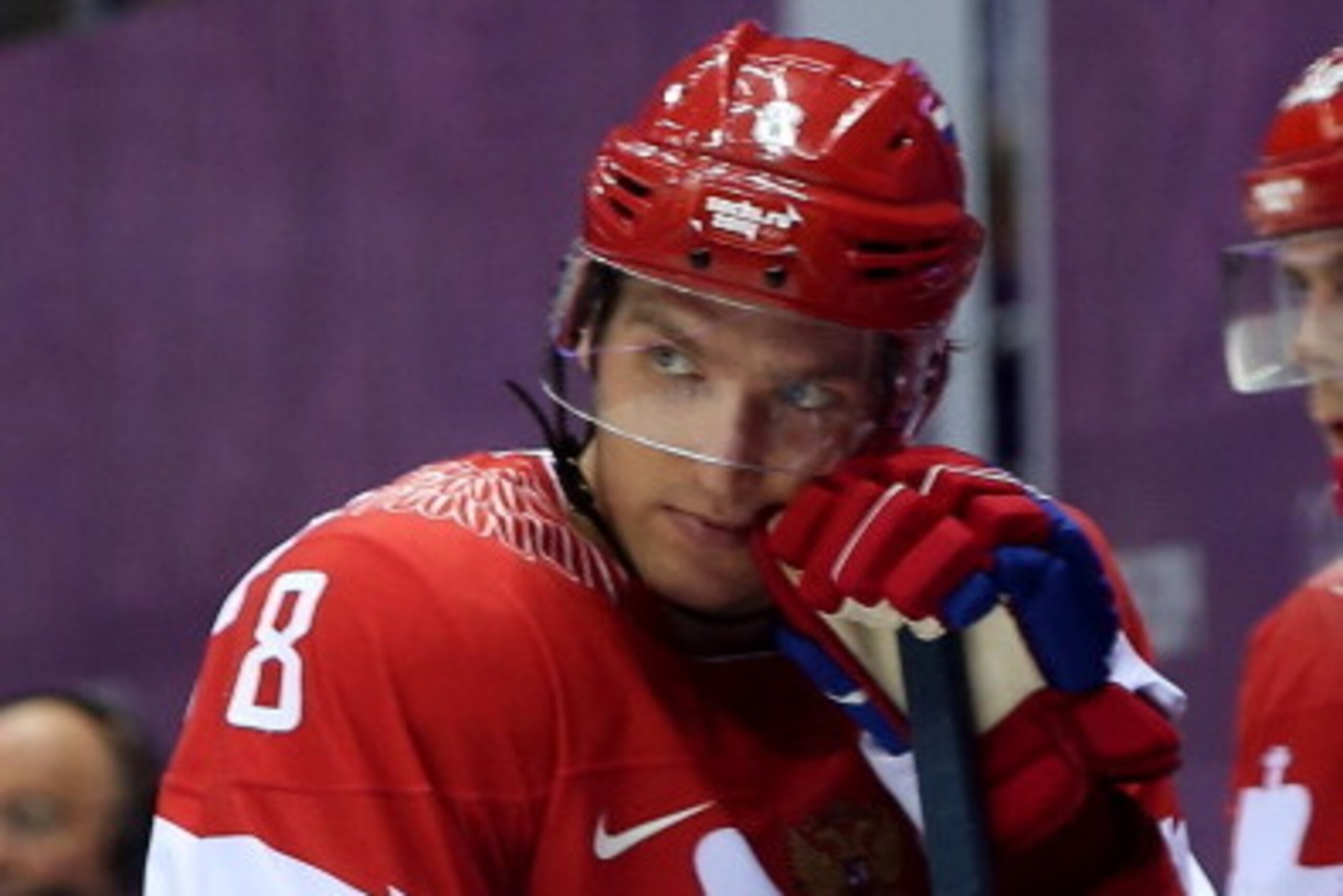 SOCHI, RUSSIA - FEBRUARY 19:  Alexander Ovechkin #8 of Russia watches from the bench during the Men's Ice Hockey Quarterfinal Playoff against Finland on Day 12 of the 2014 Sochi Winter Olympics at Bolshoy Ice Dome on February 19, 2014 in Sochi, Russia.  (