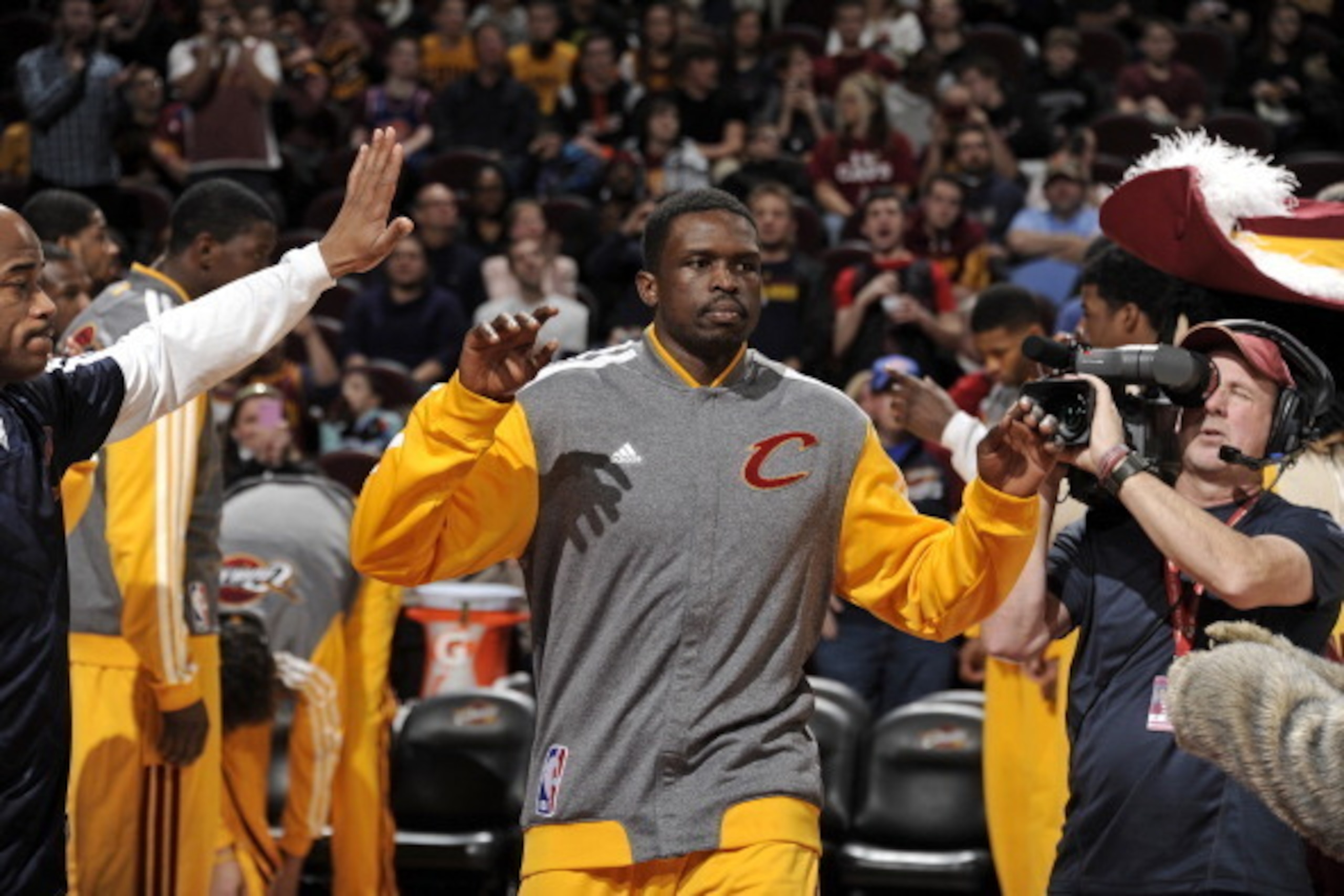 CLEVELAND, OH - JANUARY 26:  Luol Deng #9 of the Cleveland Cavaliers runs out before the game against the Phoenix Suns at The Quicken Loans Arena on January 26, 2014 in Cleveland, Ohio. NOTE TO USER: User expressly acknowledges and agrees that, by downloa
