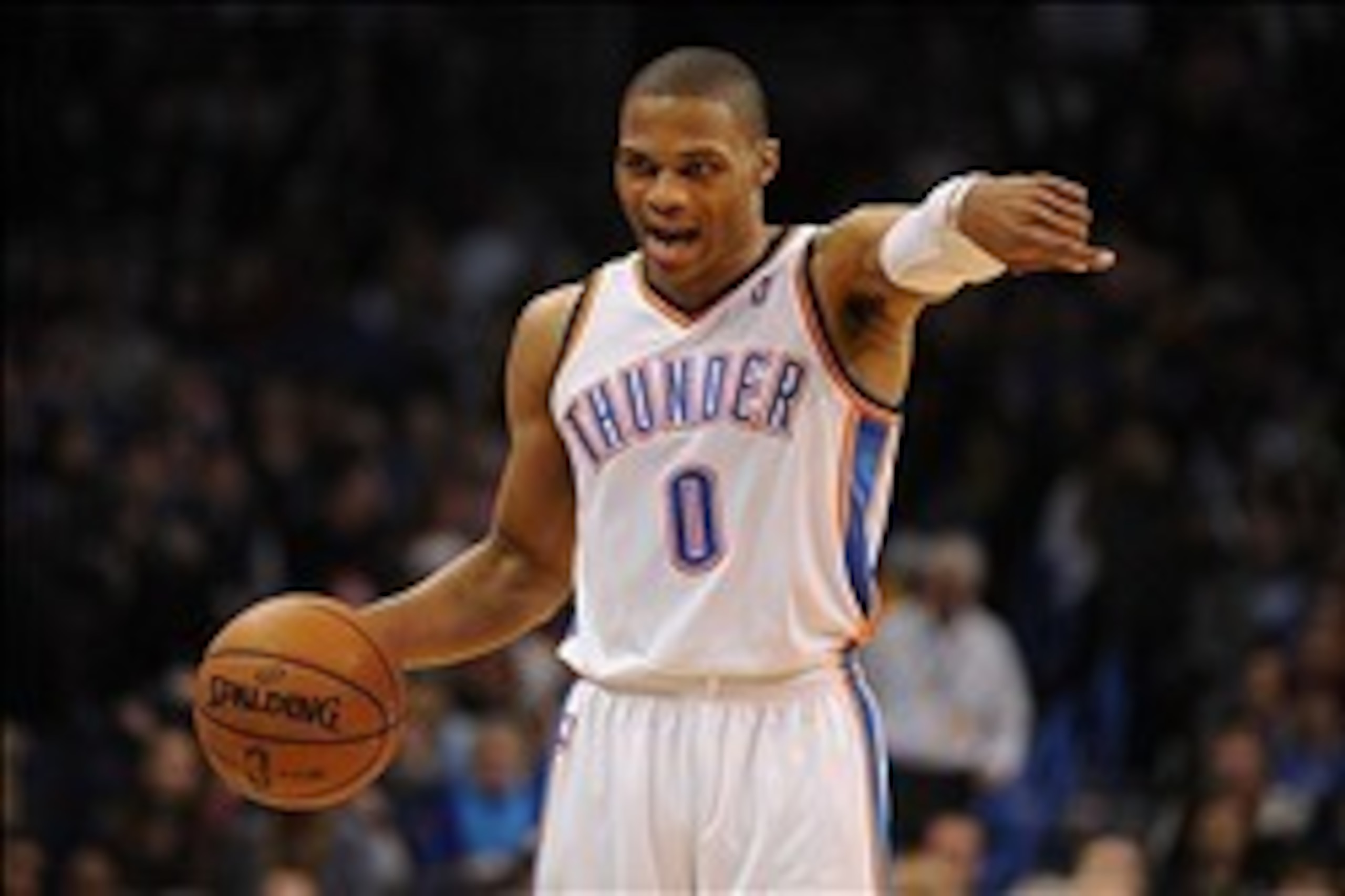 Dec 22, 2013; Oklahoma City, OK, USA; Oklahoma City Thunder point guard Russell Westbrook (0) directs his team in action against the Toronto Raptors during the third quarter at Chesapeake Energy Arena. Mandatory Credit: Mark D. Smith-USA TODAY Sports